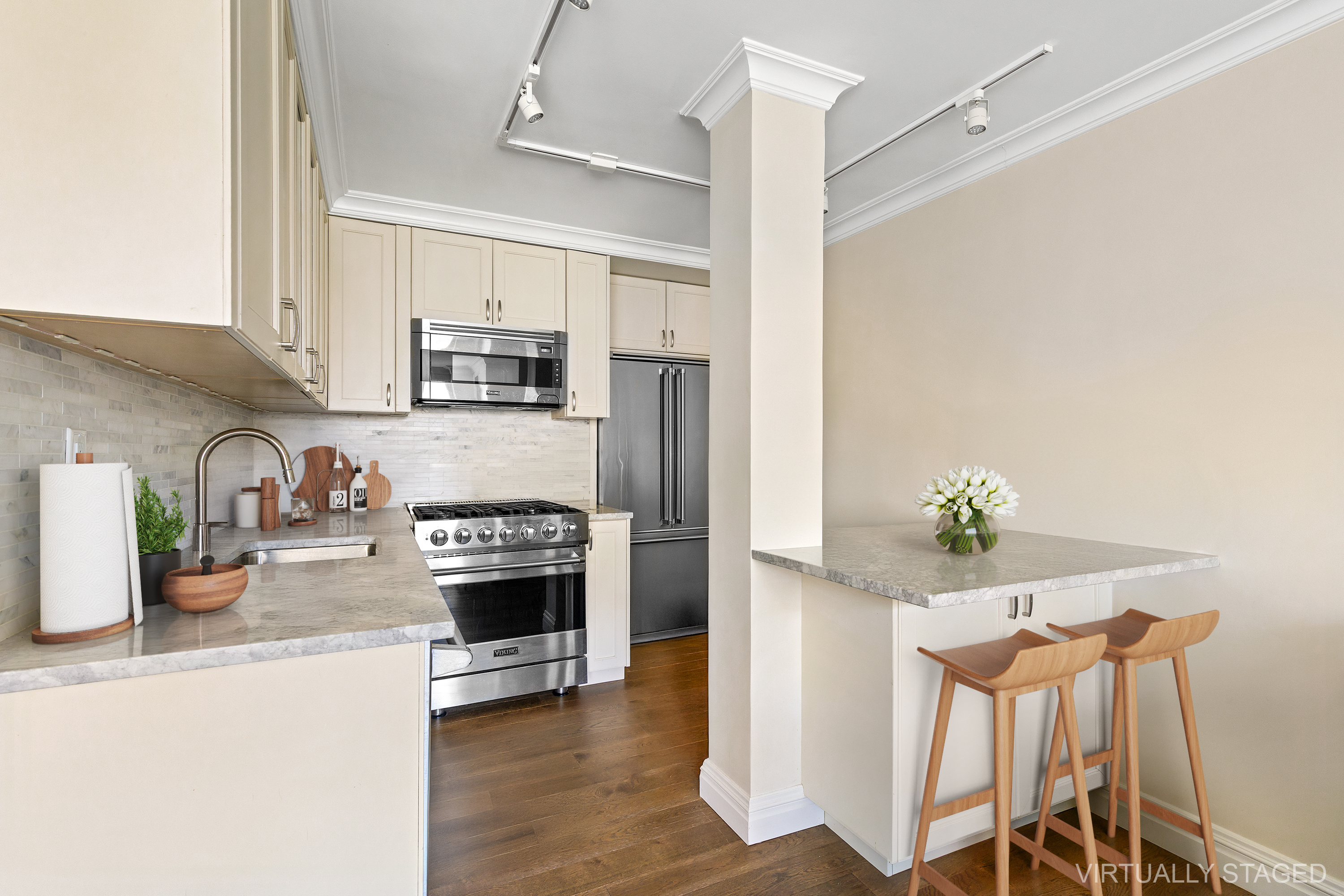 551 Main Street, Unit 208 Manhattan, NY 10044 - Photo 8 of 36 a kitchen with granite countertop a stove a sink and a refrigerator