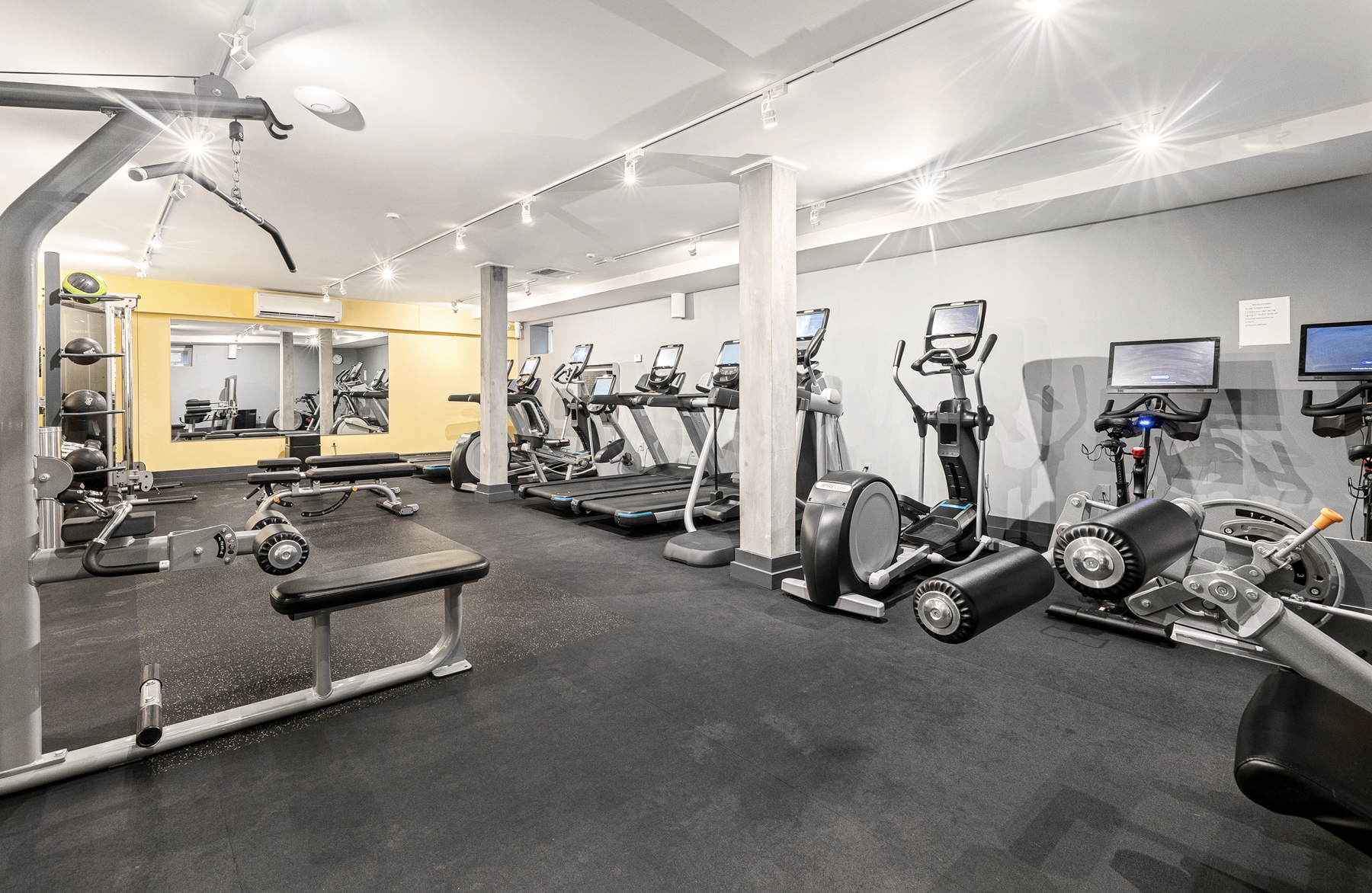 73-12 35th Avenue, Unit D56 Queens, NY 11372 - Photo 14 of 15 a view of a room with gym equipment