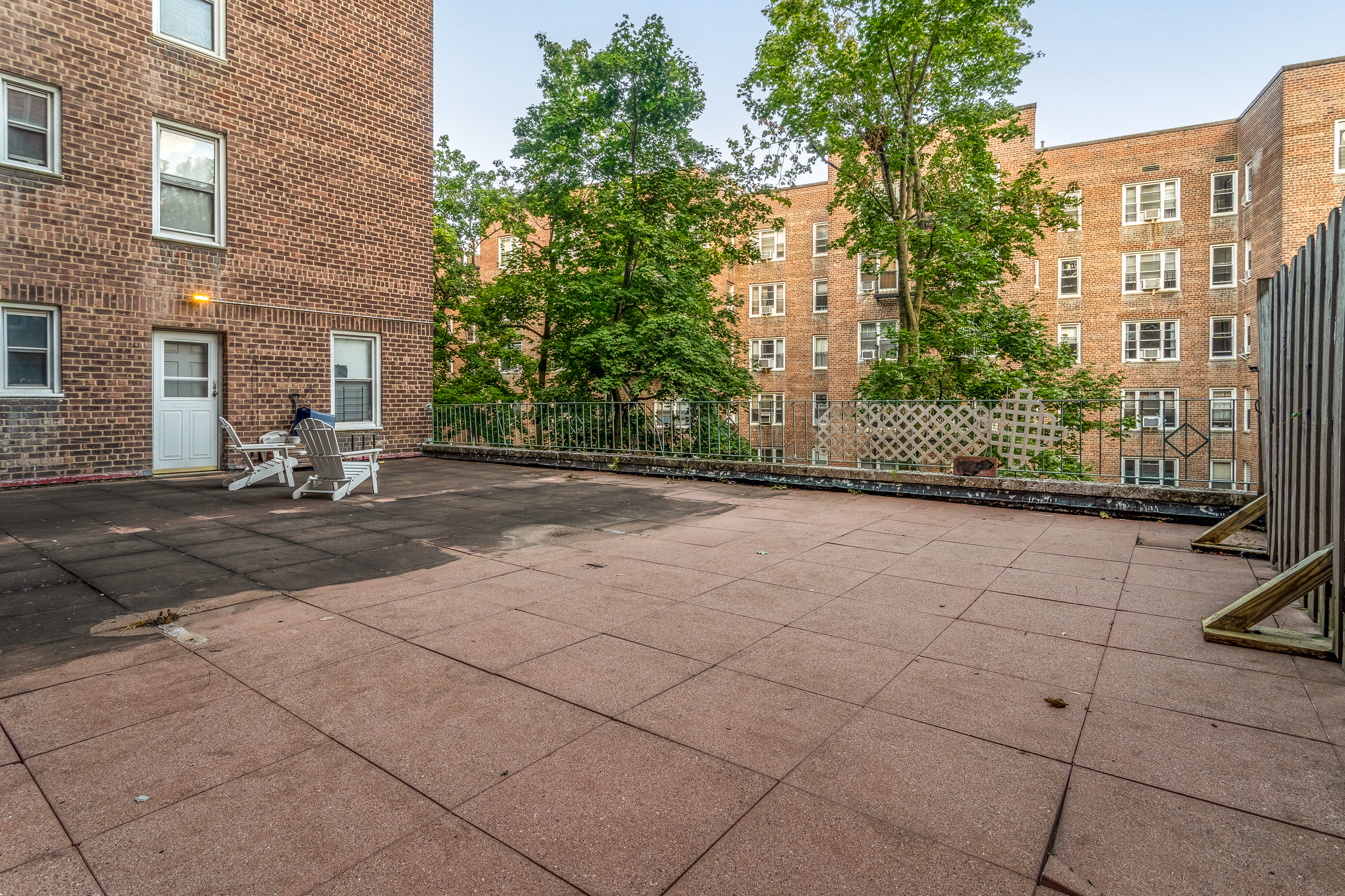 5610 Netherland Avenue, Unit 1G Bronx, NY 10471 - Photo 11 of 14 a view of a backyard with sitting area