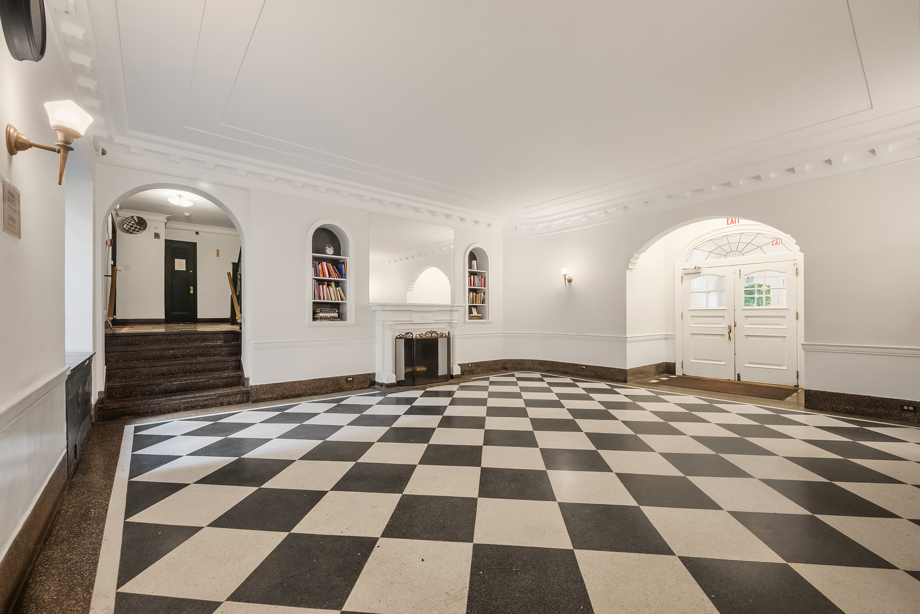 360 Clinton Avenue, Unit 4C Brooklyn, NY 11238 - Photo 9 of 13 a view of a black and white checkered floor with a rug