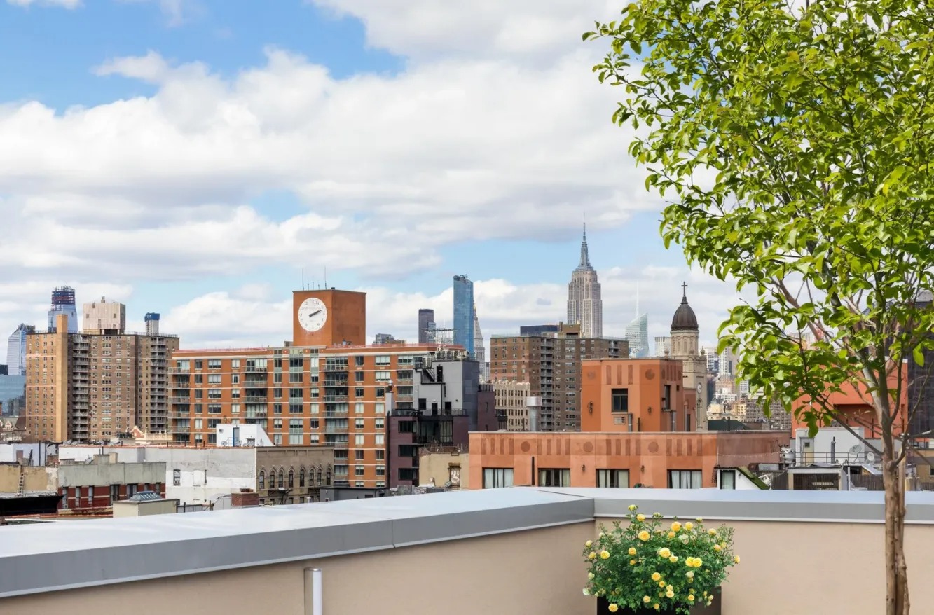 50 Clinton Street, Unit 2B Manhattan, NY 10002 - Photo 9 of 11 a view of a city with tall buildings
