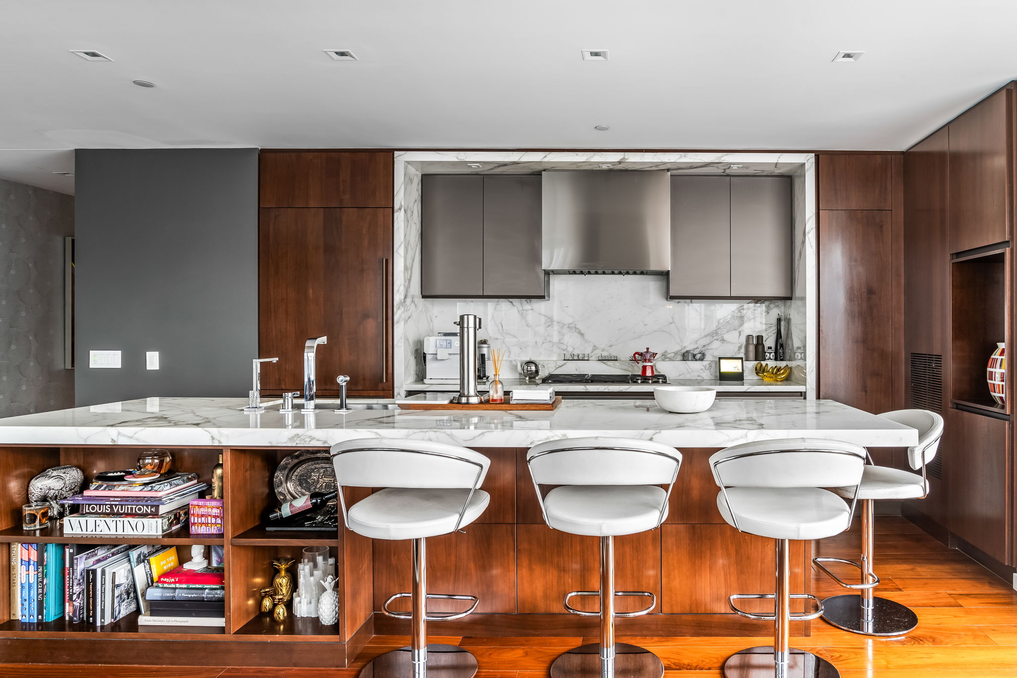 1 West End Avenue, Unit 9D Manhattan, NY 10023 - Photo 5 of 22 a kitchen with stainless steel appliances granite countertop a sink and cabinets