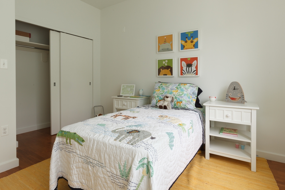 22 Caton Place, Unit 4H Brooklyn, NY 11218 - Photo 4 of 20 a bedroom with a bed and painting on the wall