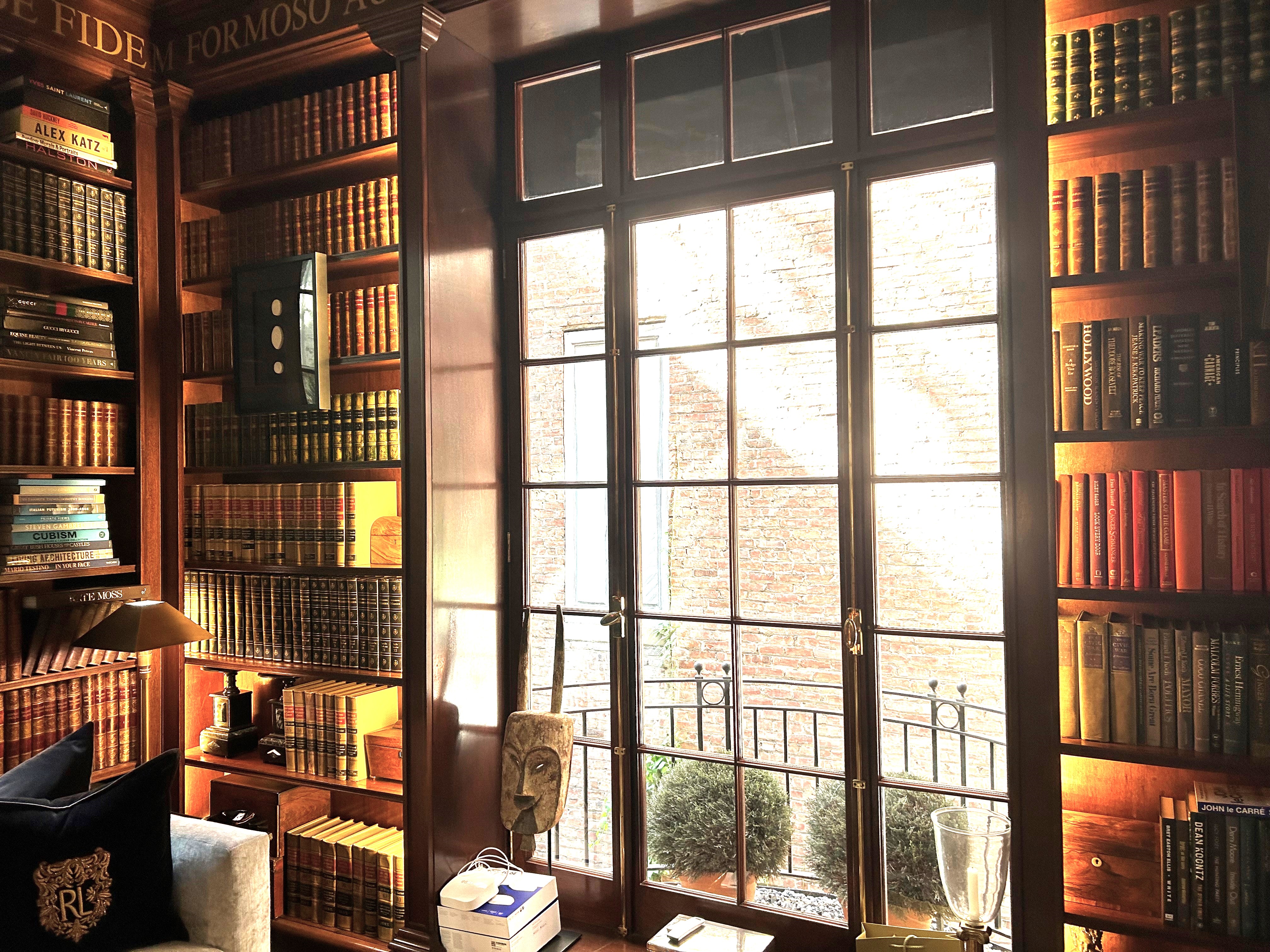 36 East 69th Street, Unit 2AB Manhattan, NY 10021 - Photo 11 of 26 a front view of a building that has glass windows