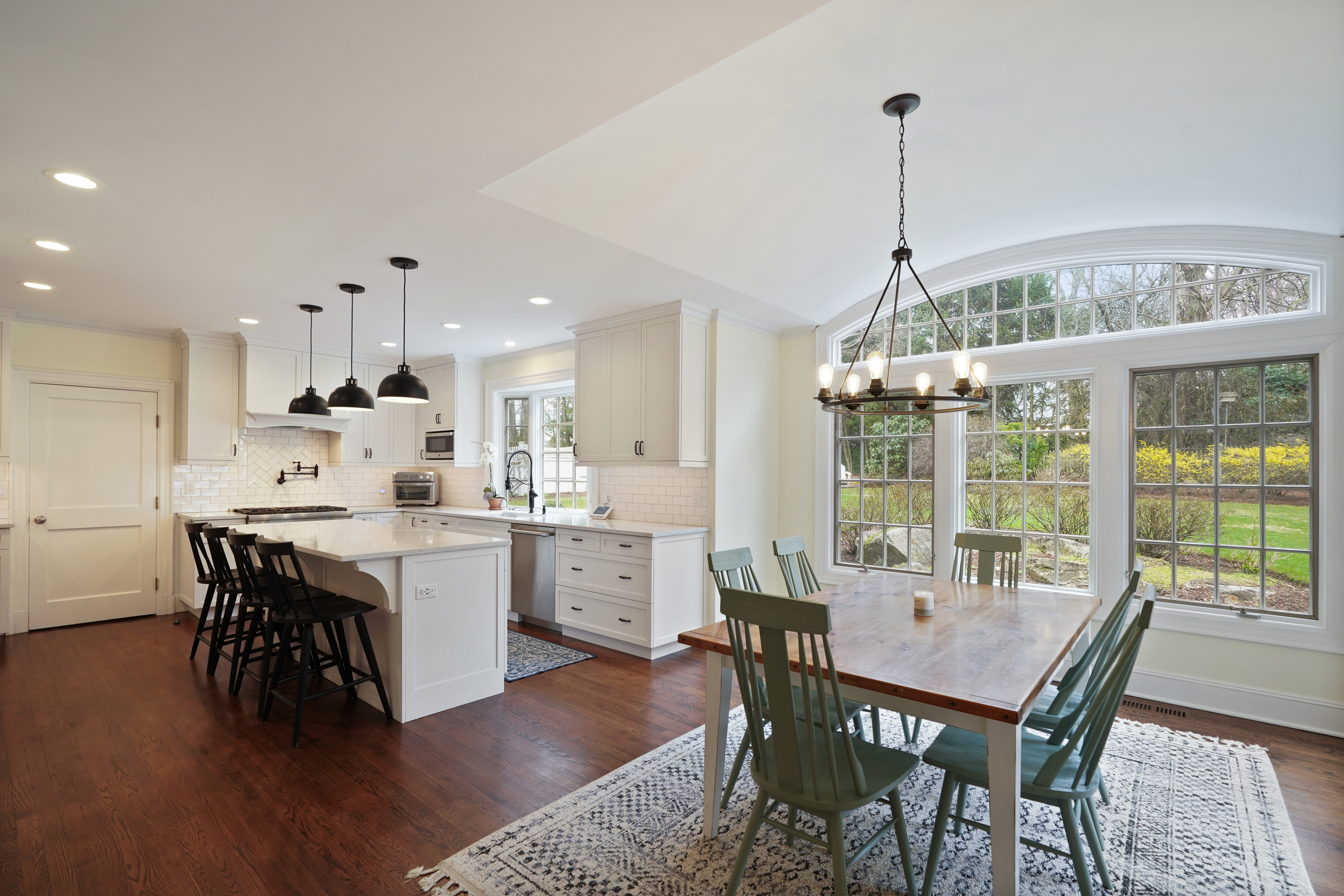 15 Anderson Road Greenwich, CT 06830 - Photo 7 of 30 a view of a dining room with furniture window and wooden floor
