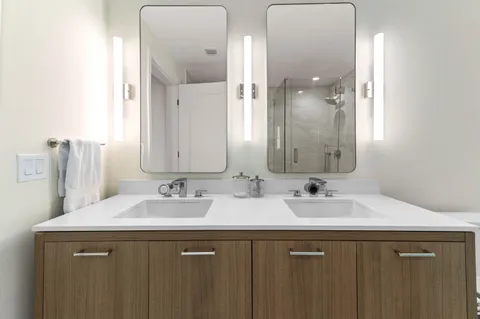 a bathroom with a tub and a shower