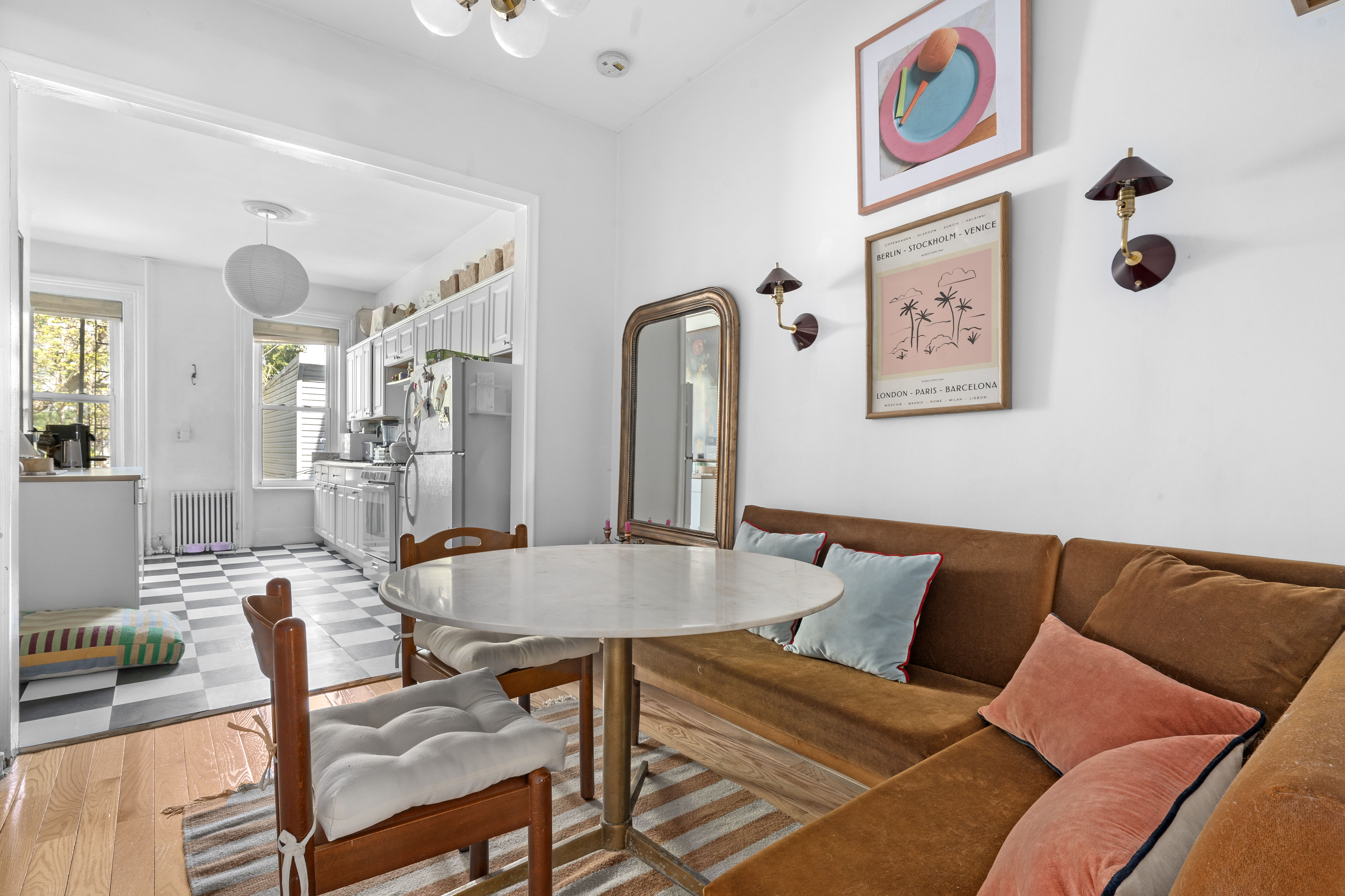 139 North 8th Street Brooklyn, NY 11249 - Photo 2 of 15 a living room with furniture and wooden floor