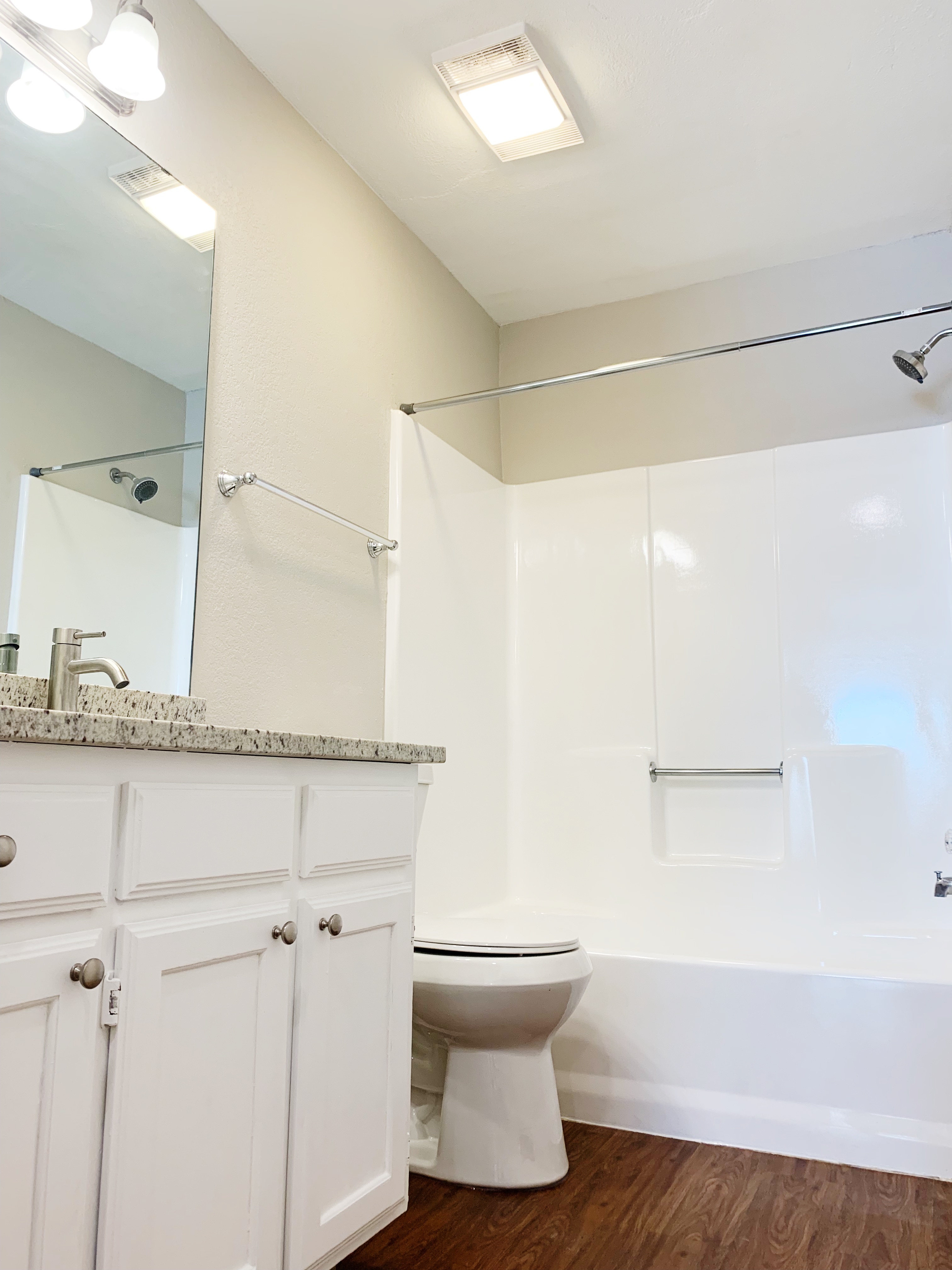 5708 Ranchogrande Drive Arlington, TX 76017 - Photo 3 of 3 a bathroom with a shower a sink and a toilet