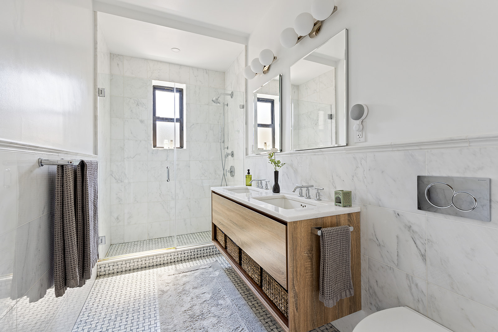 225 Eastern Parkway, Unit 6C Brooklyn, NY 11238 - Photo 7 of 12 a bathroom with a granite countertop sink and a mirror