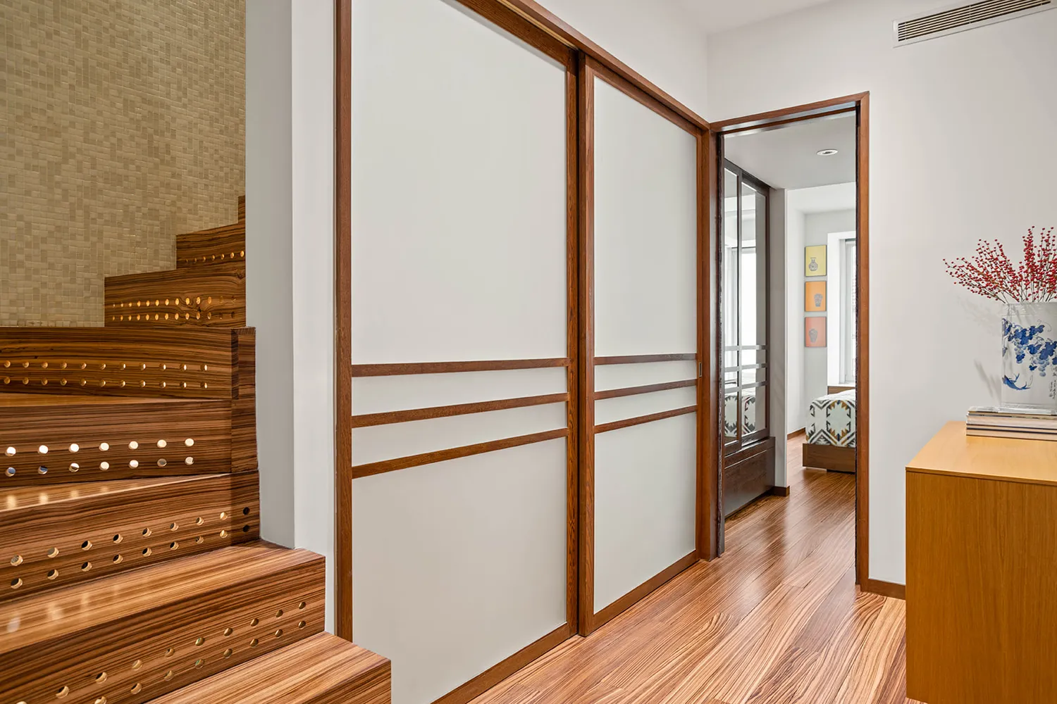 a view of entryway with wooden floor