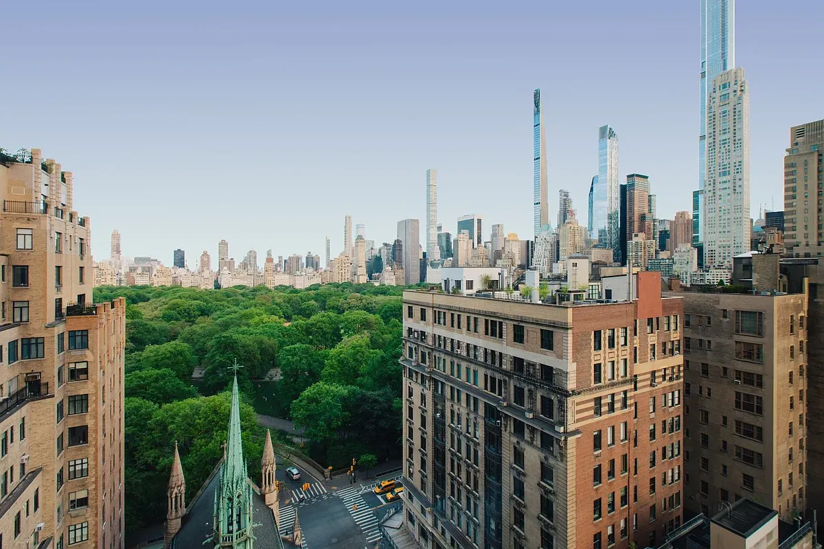a view of city with tall buildings