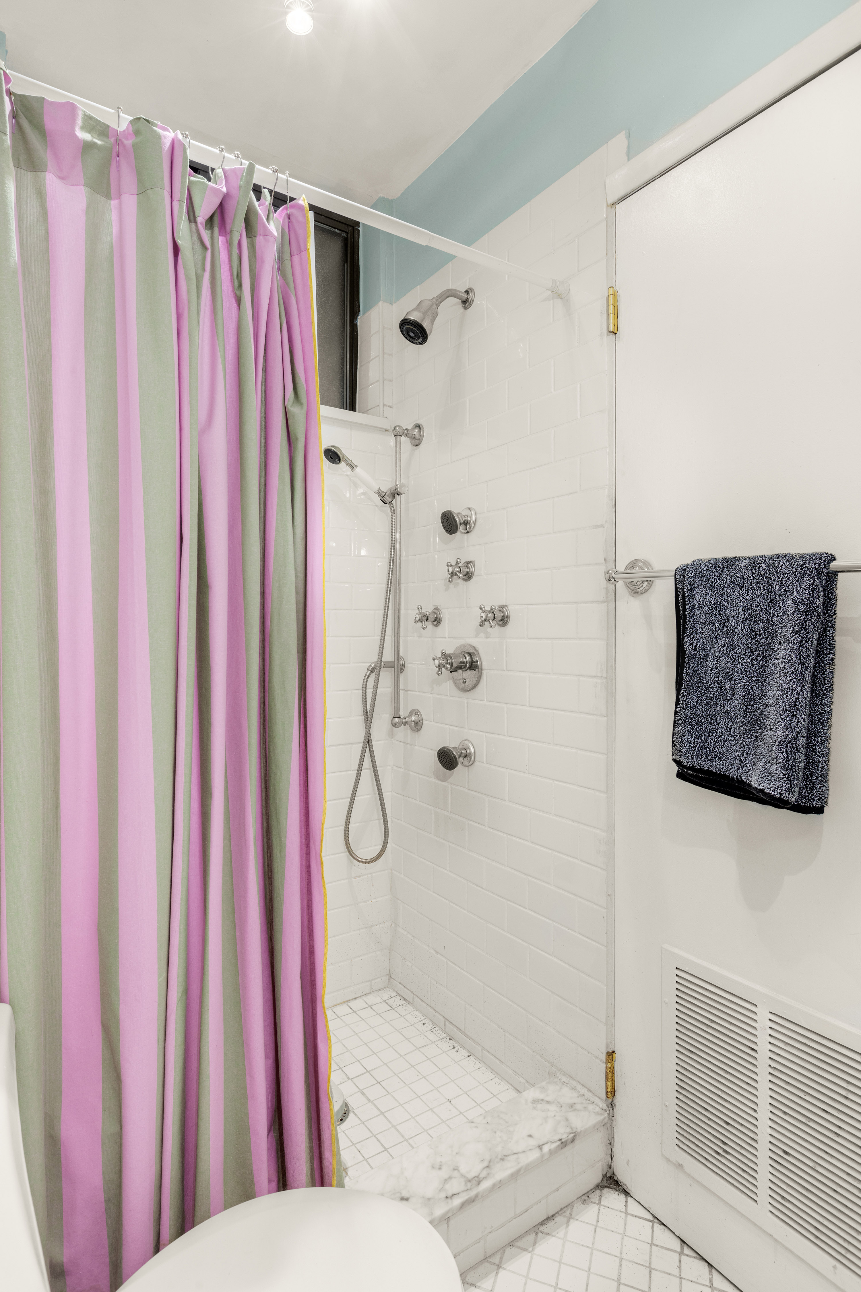 502 West 141st Street, Unit 1A Manhattan, NY 10031 - Photo 7 of 8 a bathroom with a shower curtain and a curtain