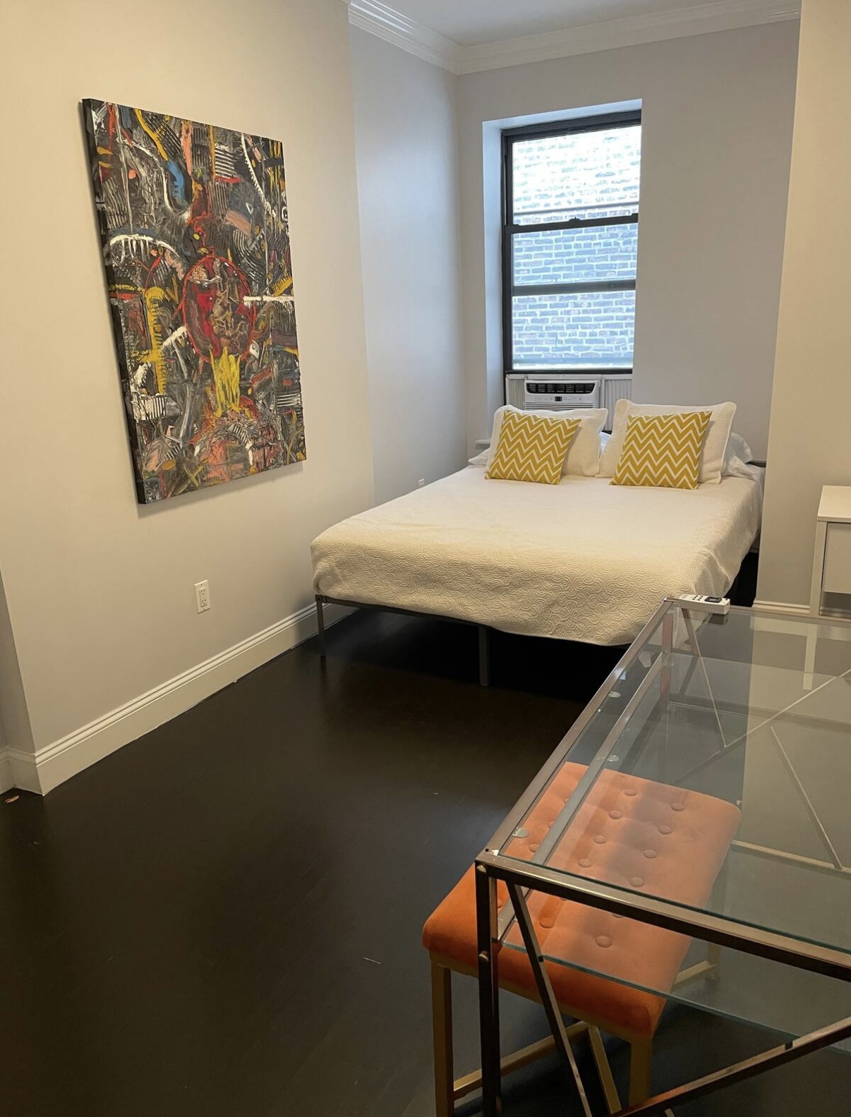 2073 Adam Clayton Powell Jr Boulevard, Unit 4 Manhattan, NY 10027 - Photo 8 of 10 a bedroom with a bed and window