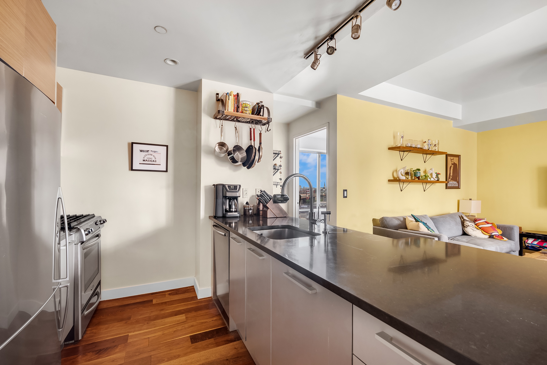 10-63 Jackson Avenue, Unit 7A Queens, NY 11101 - Photo 2 of 11 a view of a room with gym equipment