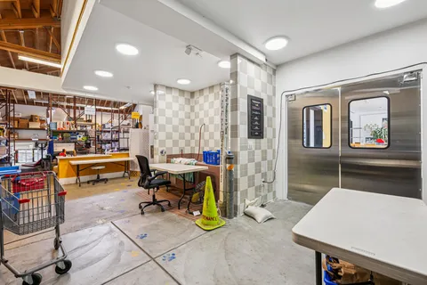 a bathroom with a bathtub and shower