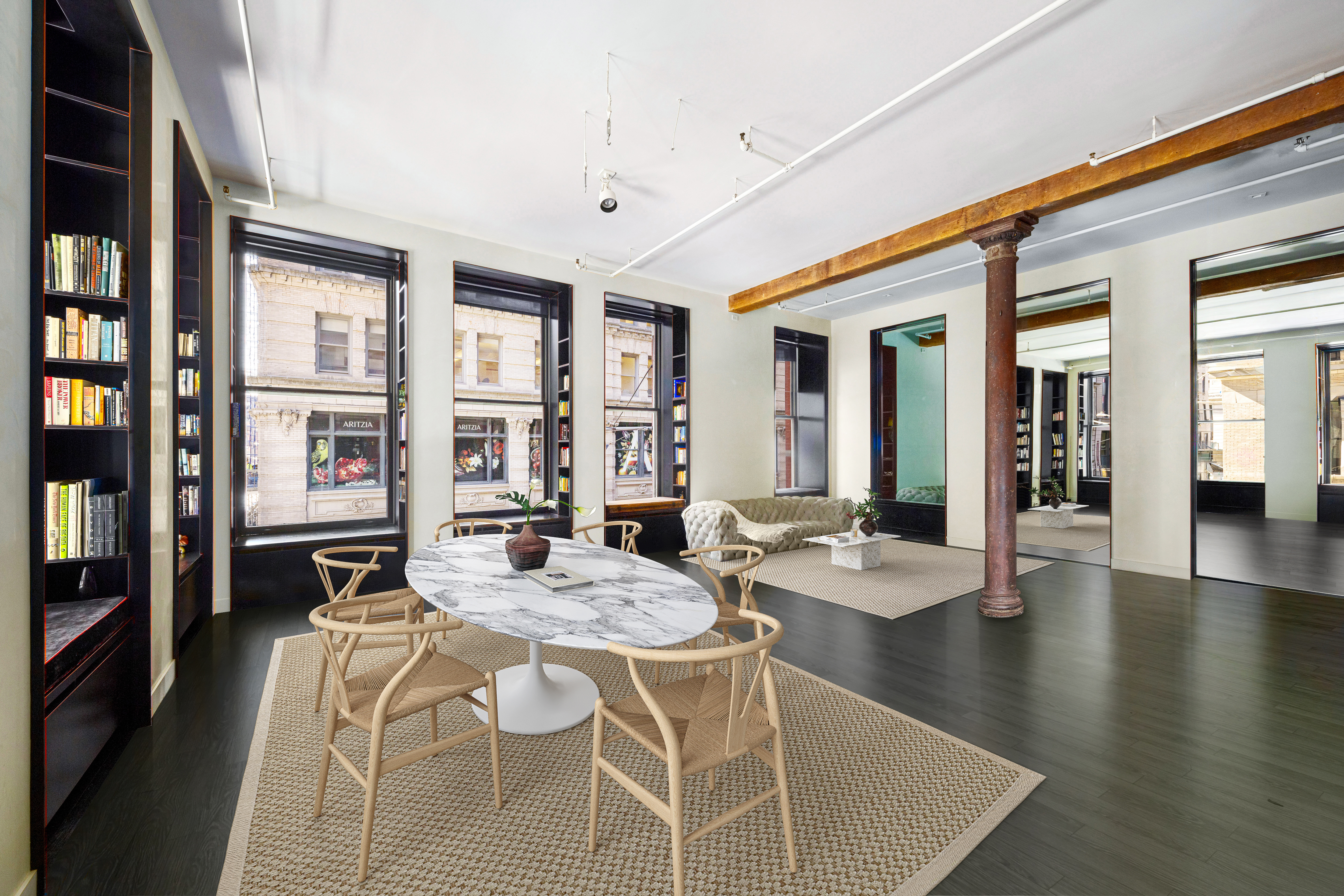 76 Crosby Street, Unit 2B Manhattan, NY 10012 - Photo 3 of 17 a view of a dining room with furniture