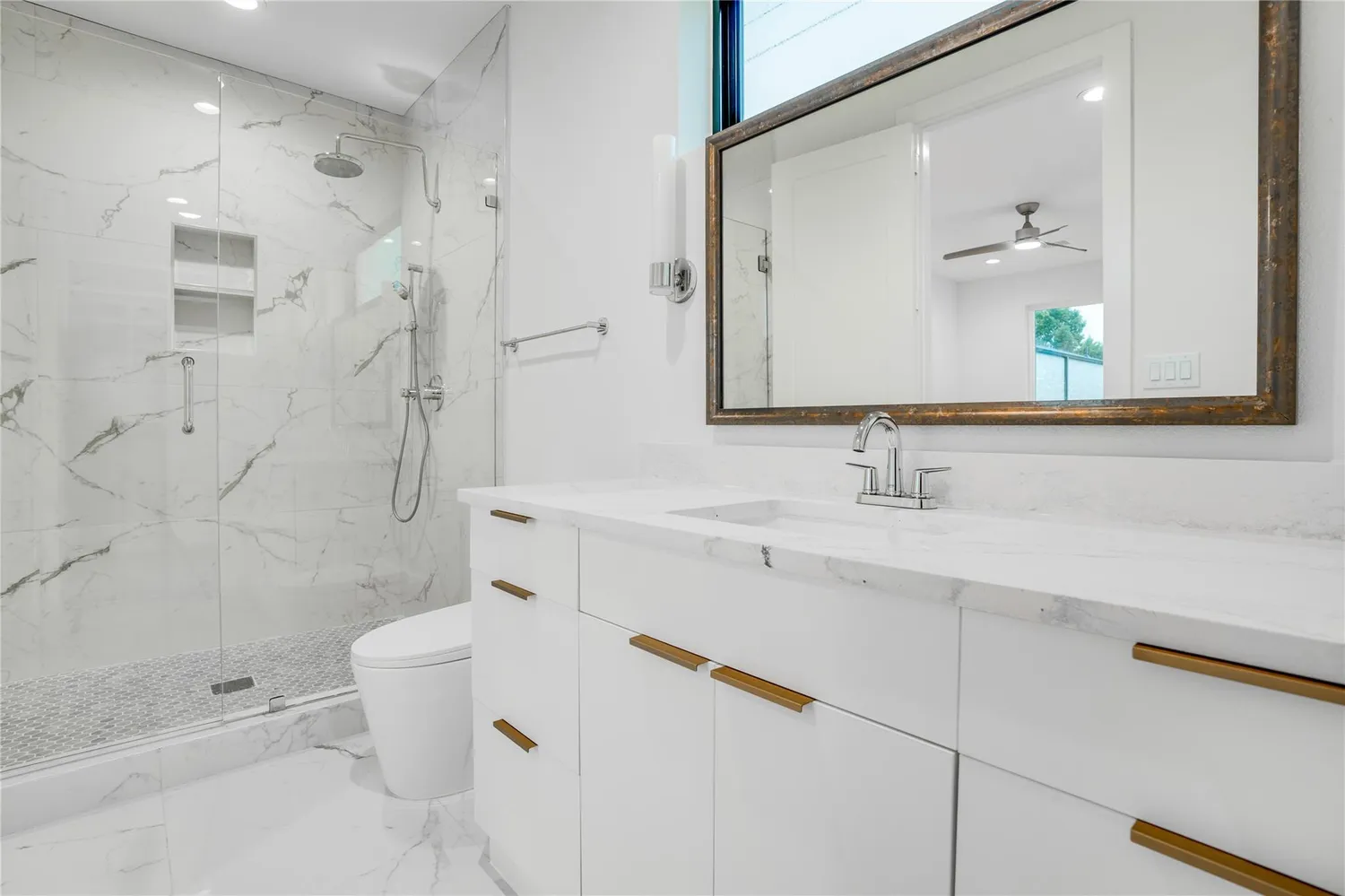 a view of a room with white walls