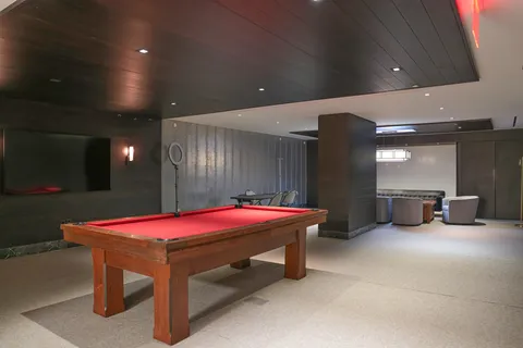 a patio with a table and chairs