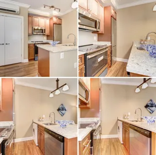 a kitchen with kitchen island a sink stove and refrigerator