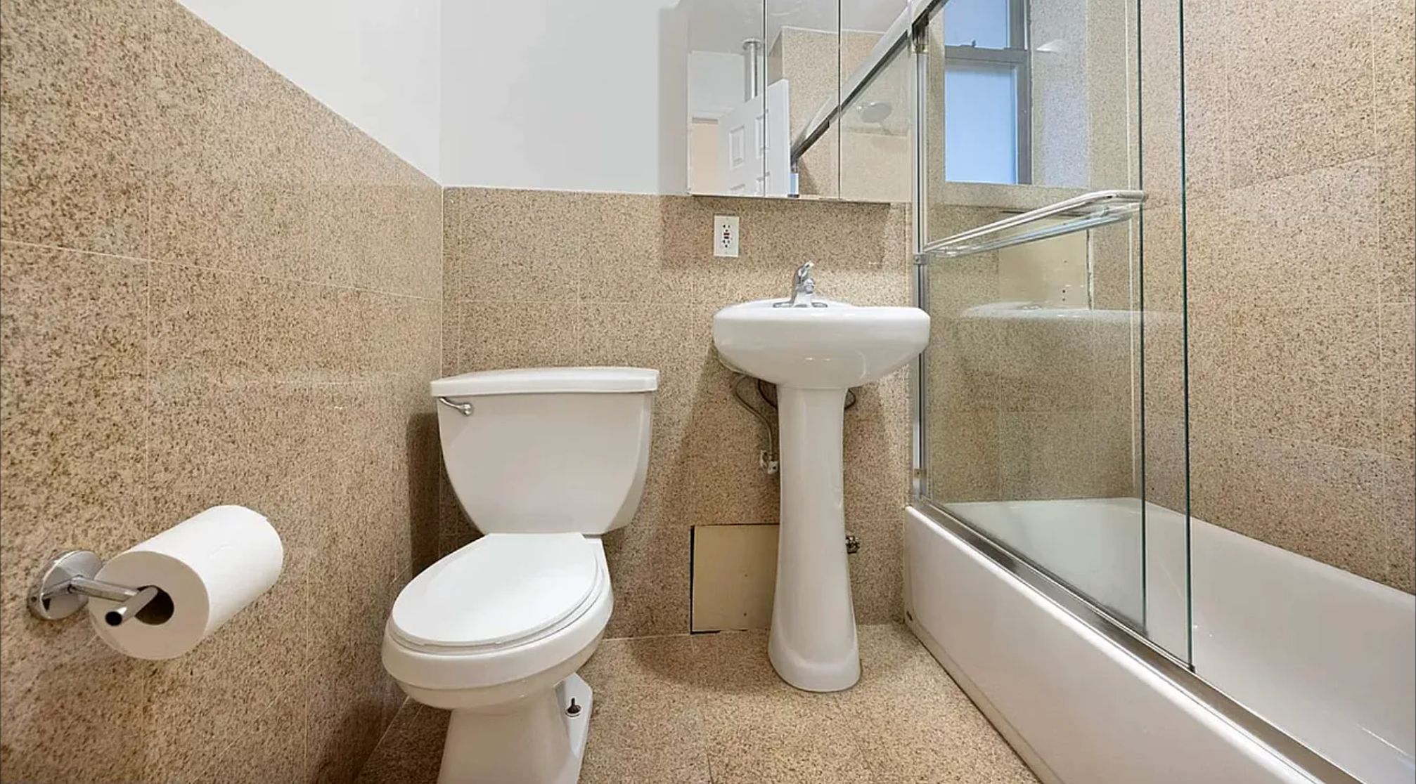 370 Columbus Avenue, Unit 4F Manhattan, NY 10024 - Photo 6 of 13 a bathroom with a sink a toilet and bathtub