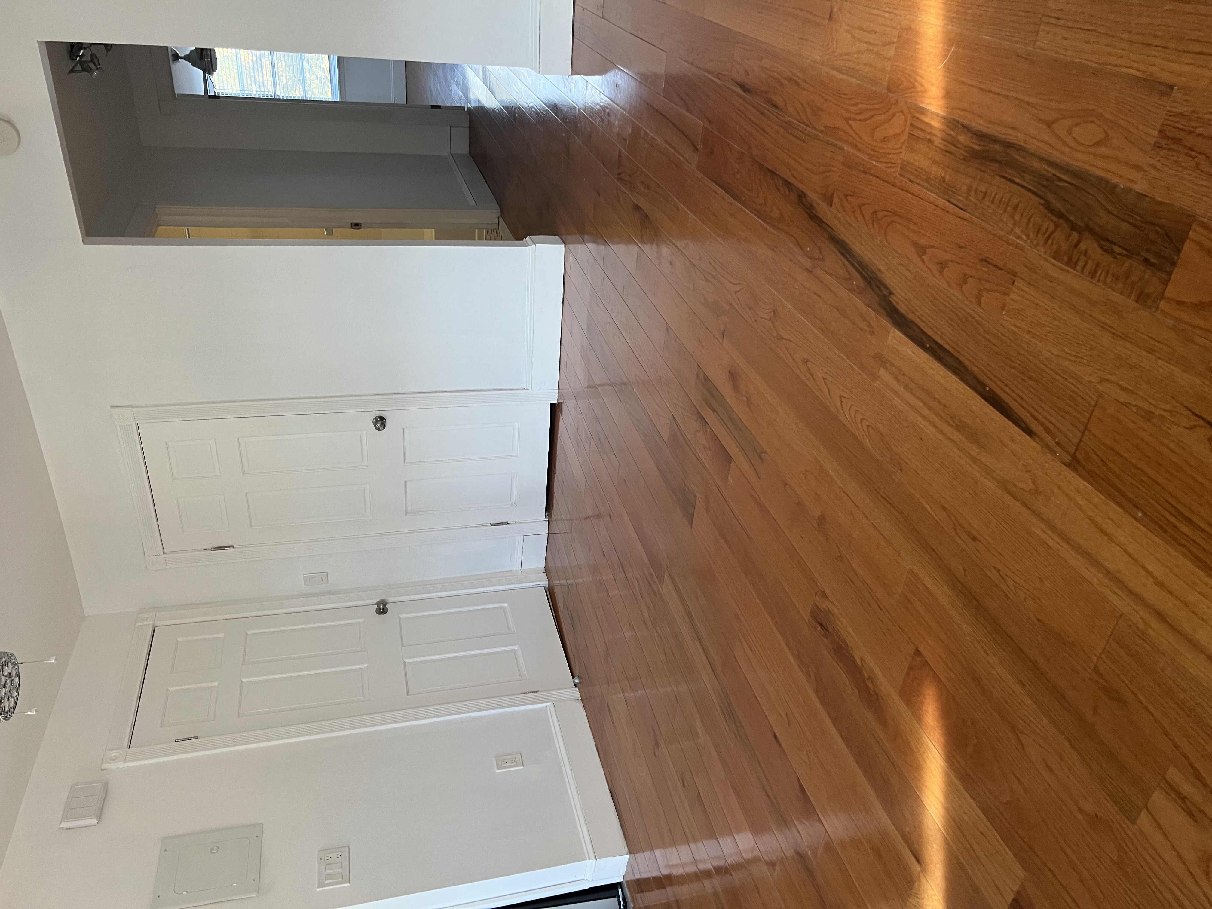 160 Macon Street, Unit 3 Brooklyn, NY 11216 - Photo 3 of 7 a view of empty room with wooden floor