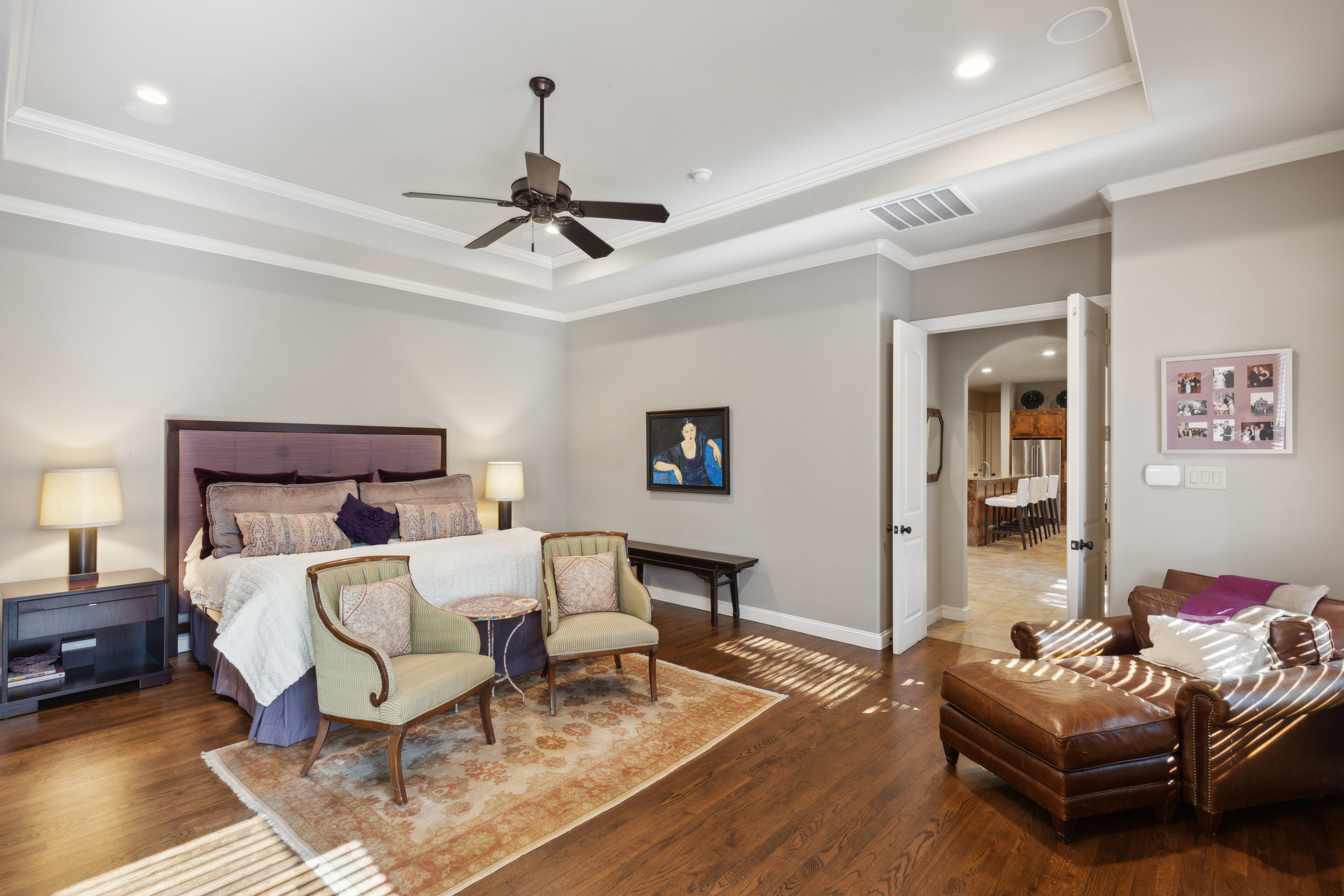 8411 Midway Road Dallas, TX 75209 - Photo 19 of 29 a bedroom with furniture and a wooden floor
