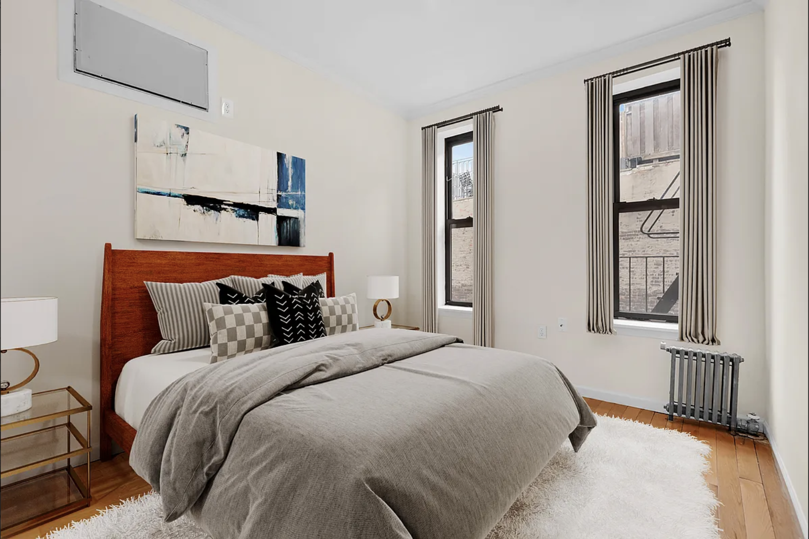 370 Columbus Avenue, Unit 2 Manhattan, NY 10024 - Photo 5 of 10 a bedroom with a large bed and a window