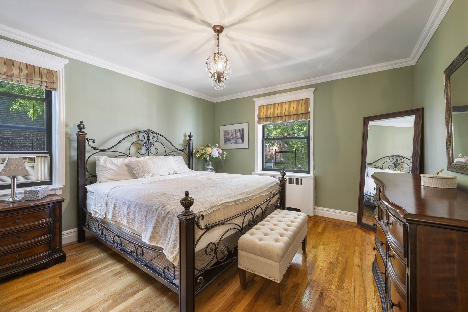 3215 Netherland Avenue, Unit 5C Bronx, NY 10463 - Photo 11 of 14 a bedroom with a bed and wooden floor