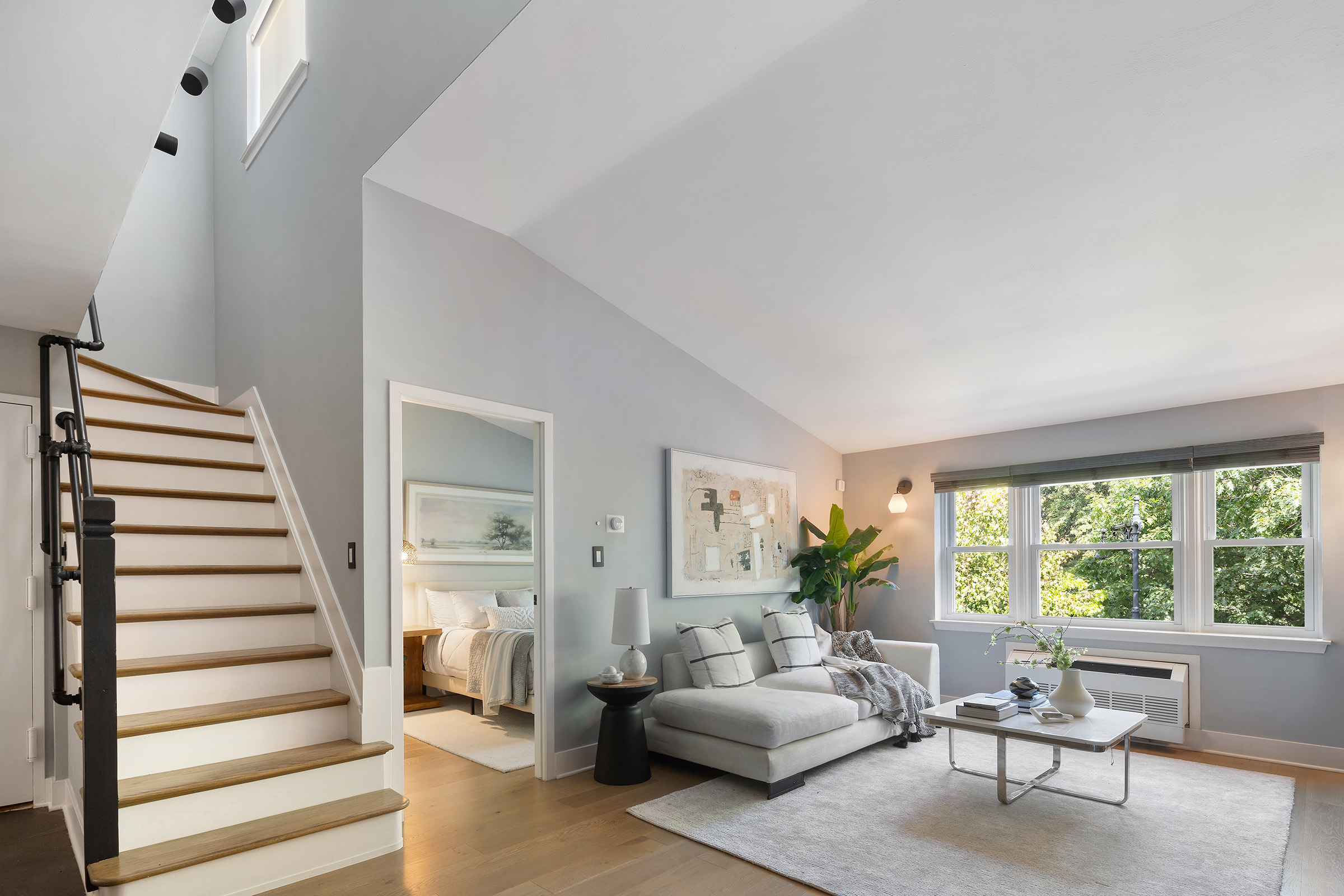 113 Prospect Park Southwest, Unit 12 Brooklyn, NY 11218 - Photo 5 of 13 a living room with furniture and a large window