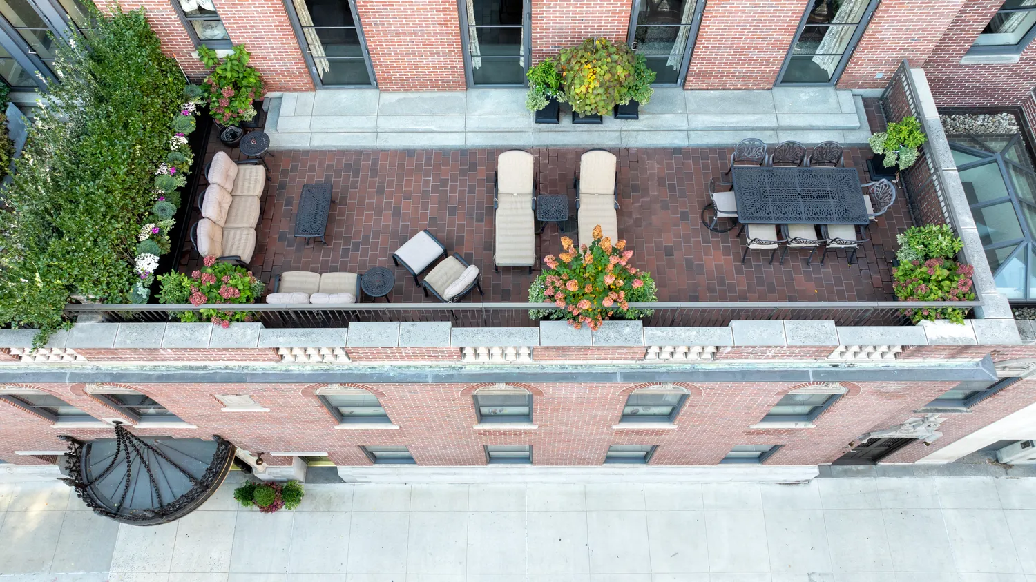 a front view of a house with outdoor seating