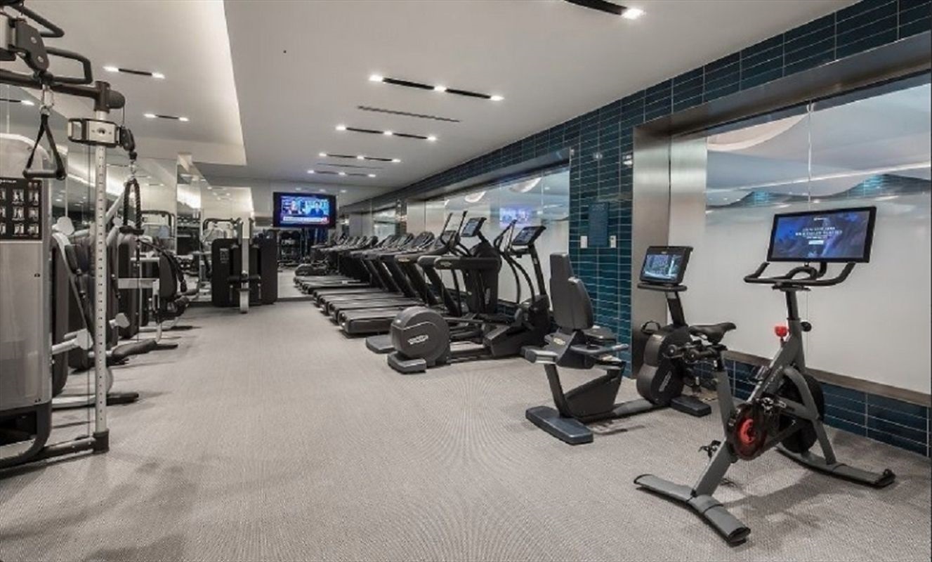 70 Charlton Street, Unit 7E Manhattan, NY 10014 - Photo 12 of 17 a view of a room with gym equipment