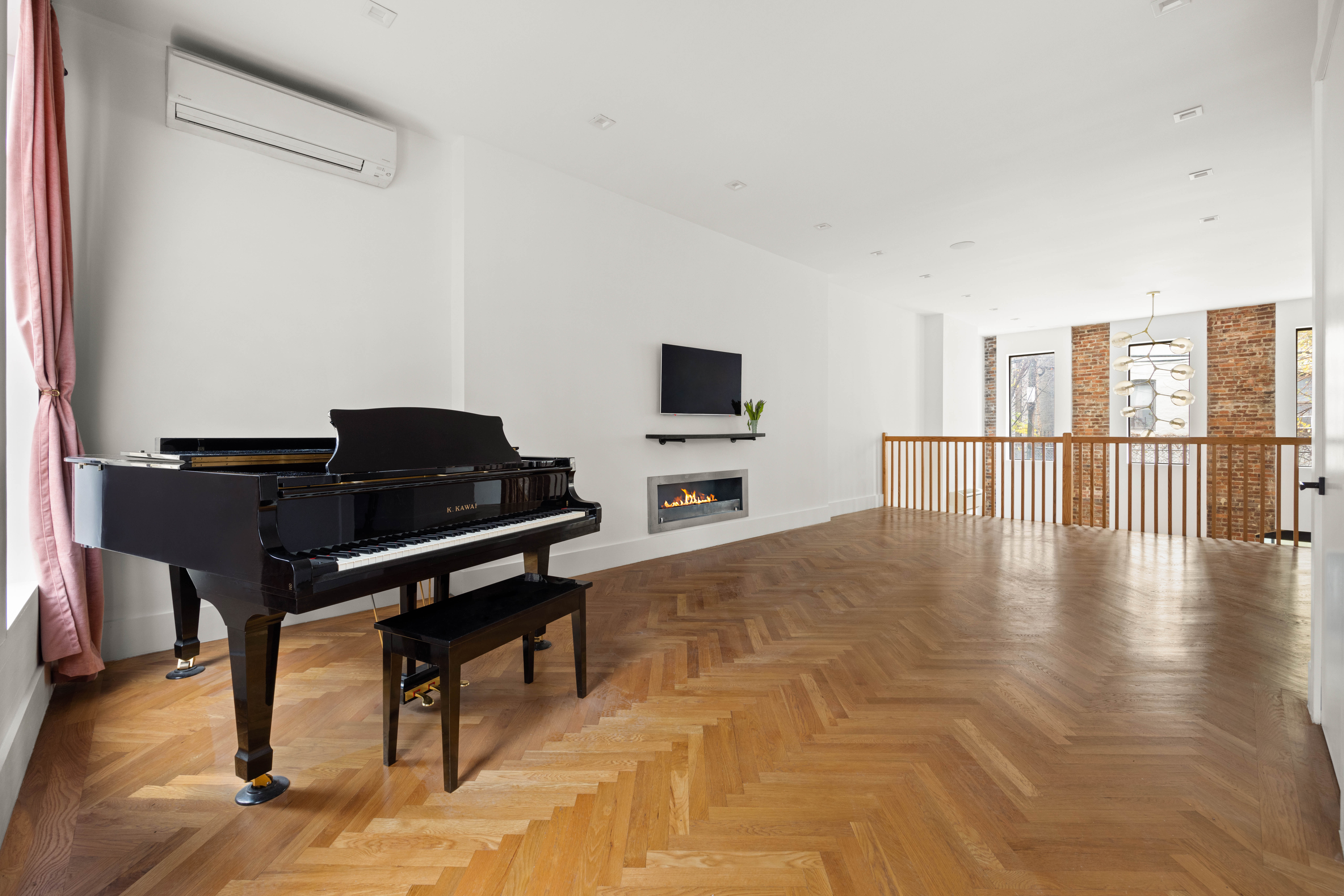 750 Lincoln Place Brooklyn, NY 11216 - Photo 5 of 24 a view of a livingroom with furniture and a flat screen tv