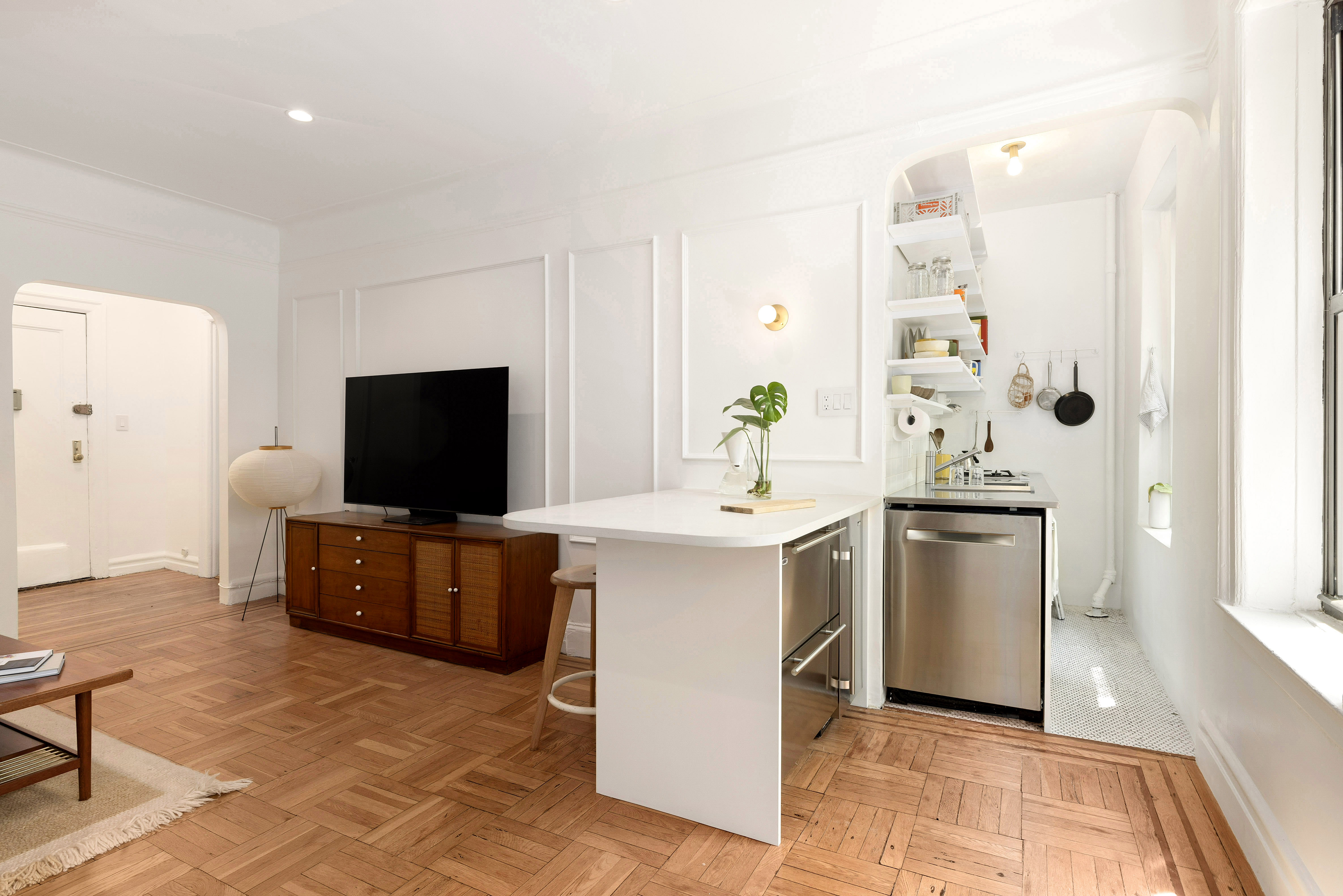 333 4th Street, Unit 2A Brooklyn, NY 11215 - Photo 4 of 12 a living room with furniture and a flat screen tv
