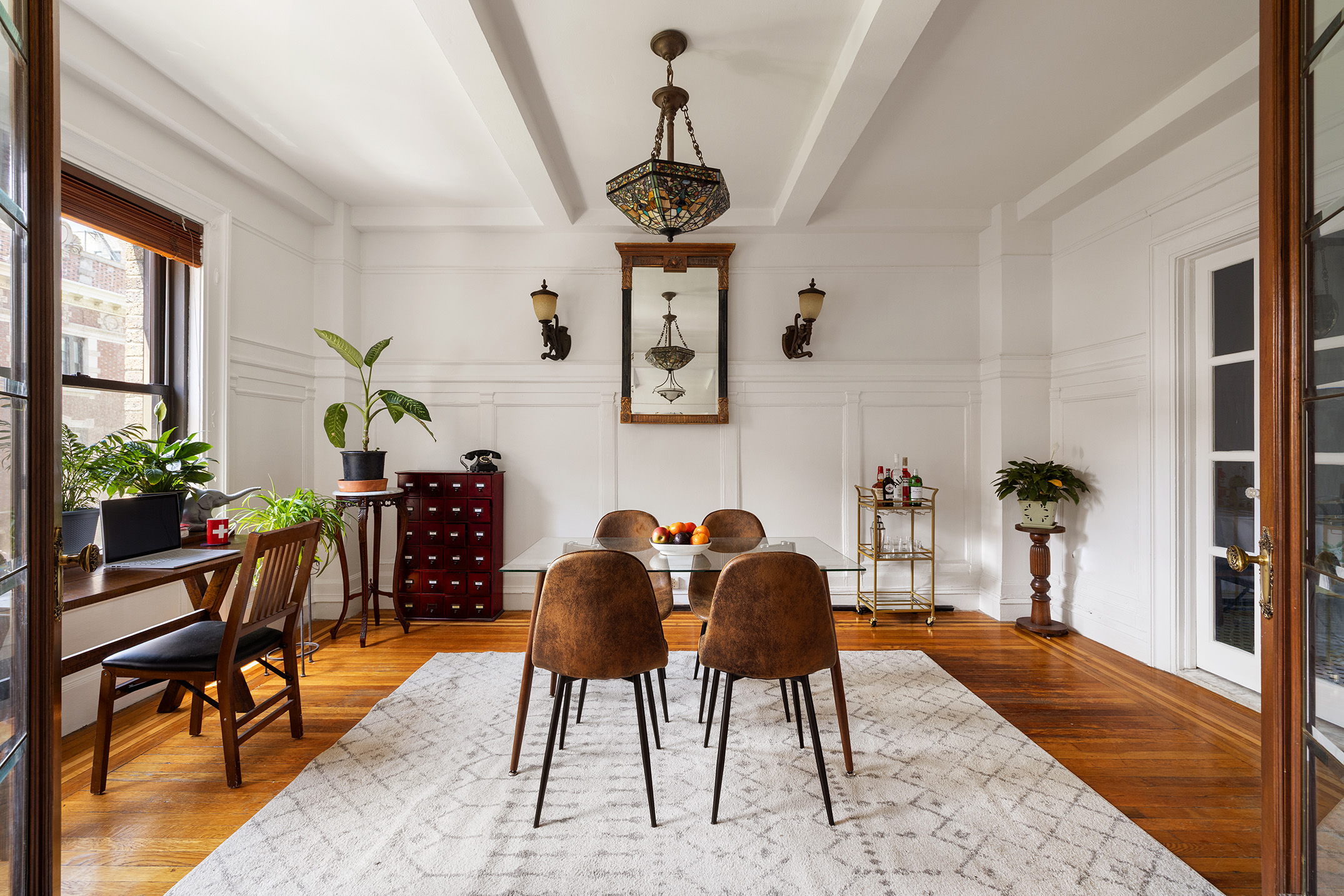 609 West 114th Street, Unit 54 Manhattan, NY 10025 - Photo 3 of 10 a view of a dining room with furniture and window