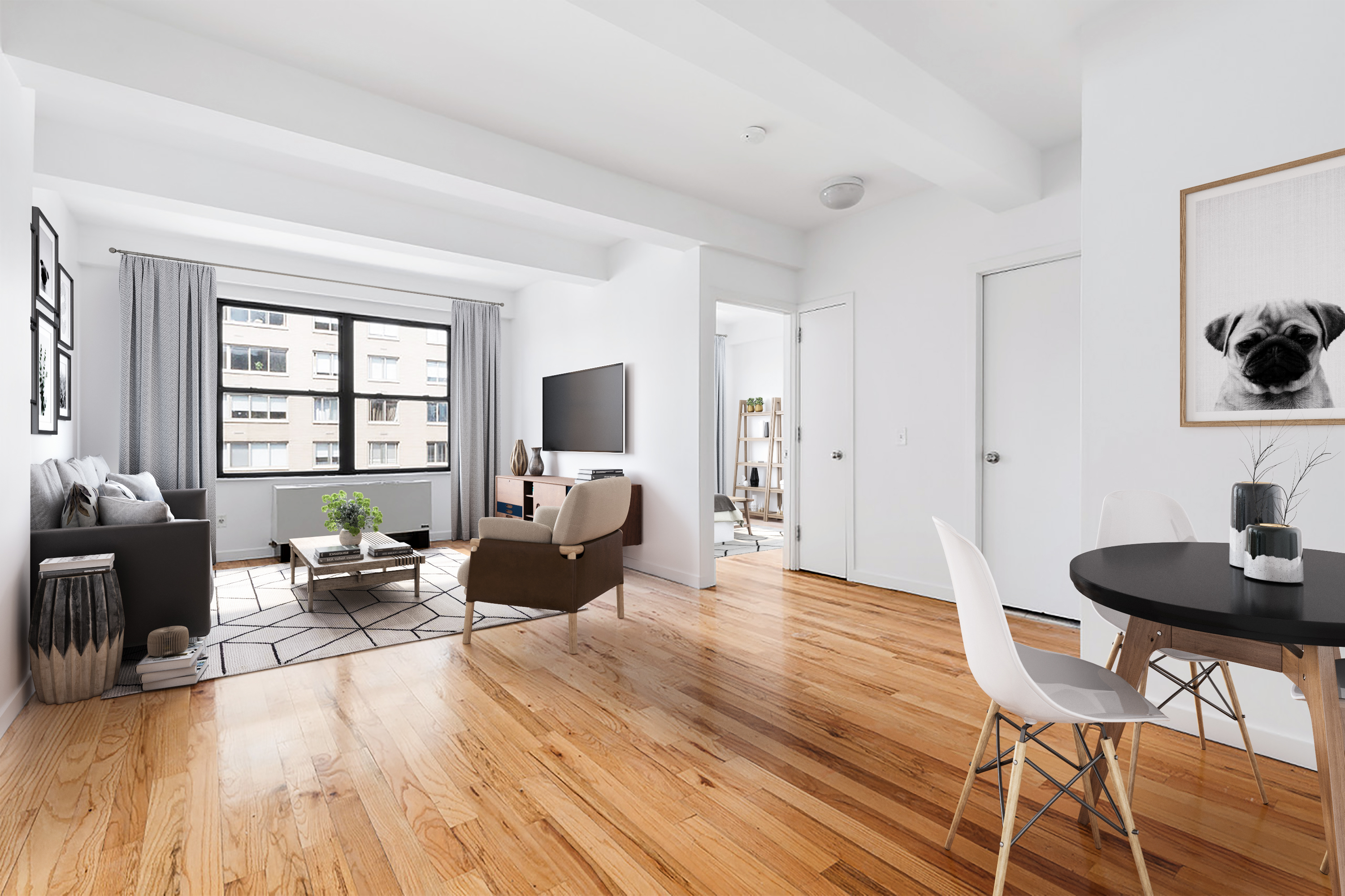 60 West 14th Street, Unit 7C Manhattan, NY 10011 - Photo 1 of 10 a living room with furniture and a large window