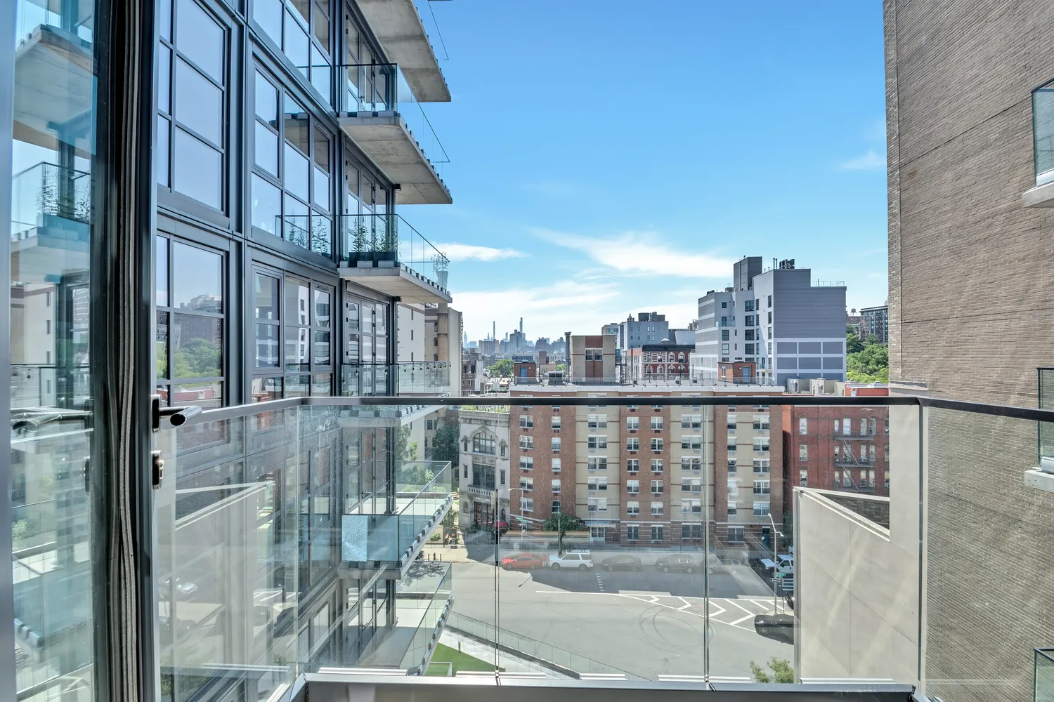 a view of a balcony with city view