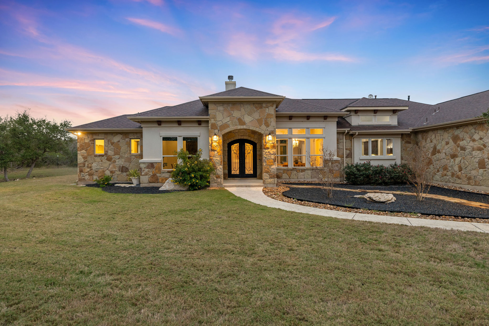 812 Jennings Branch Georgetown, TX 78633 - Photo 6 of 100 a front view of a house with garden