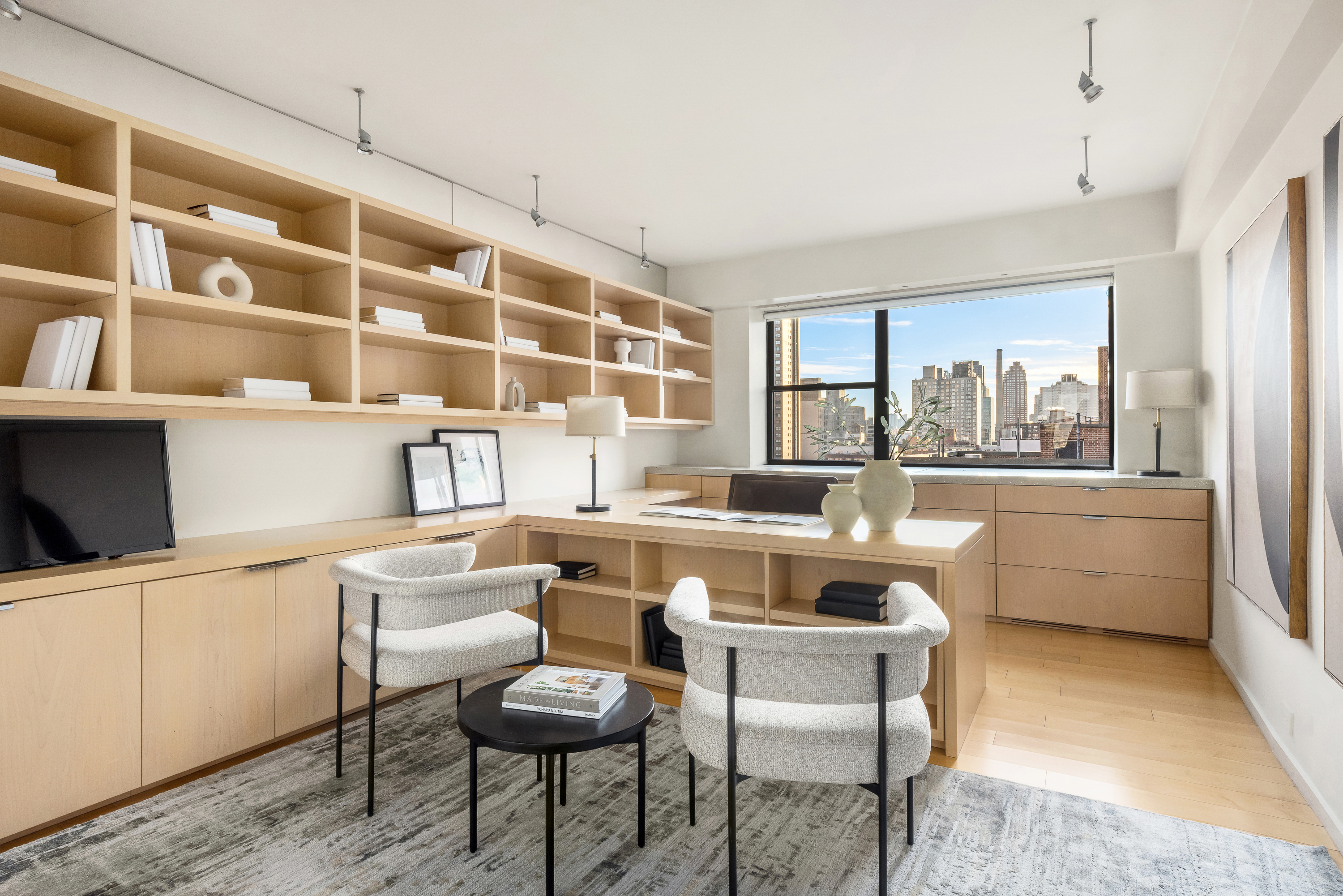 510 East 86th Street, Unit 17C Manhattan, NY 10028 - Photo 25 of 31 a kitchen with a dining table chairs and view of living room