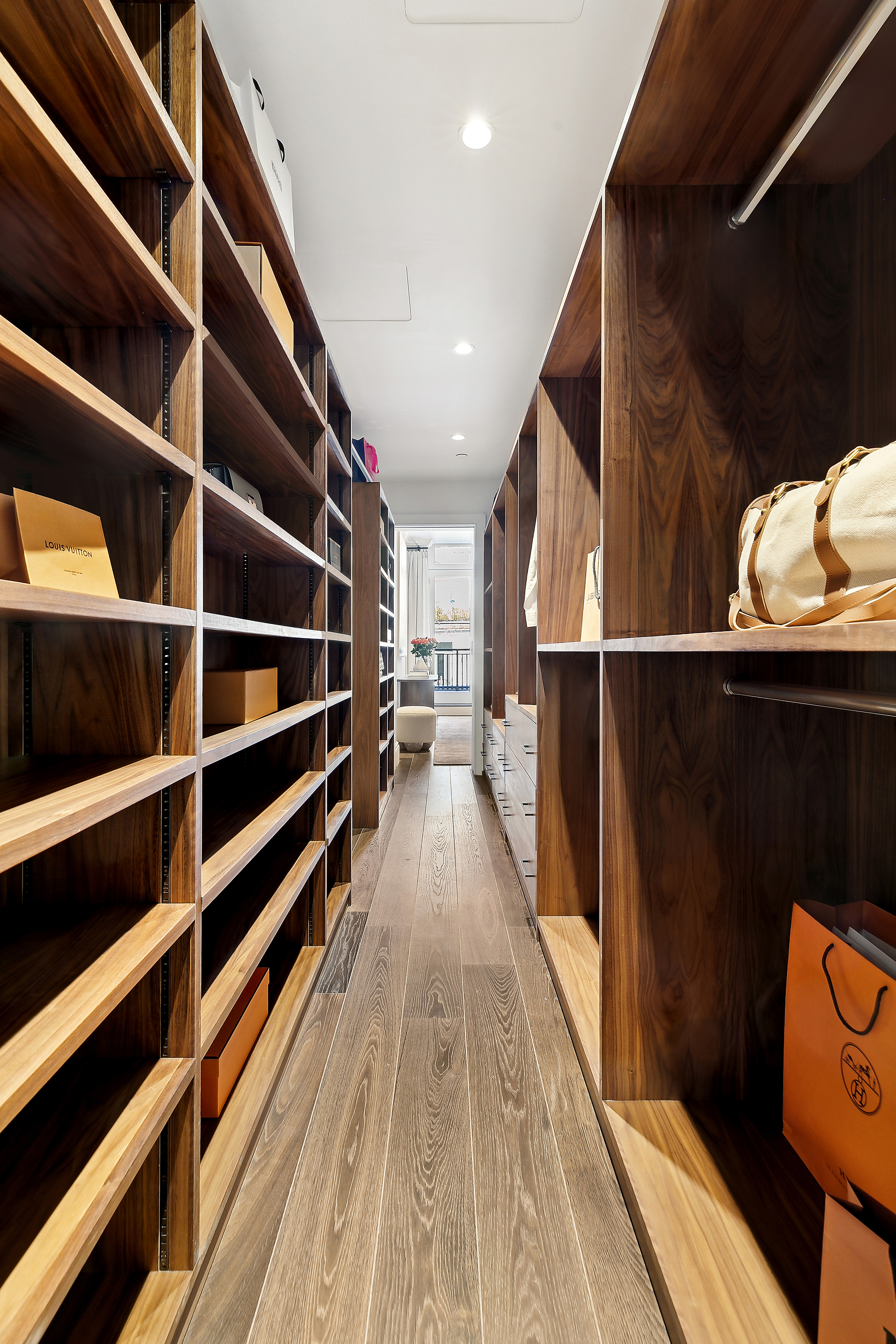 47 West 94th Street Manhattan, NY 10025 - Photo 14 of 20 a view of walk in closet with clothes and shoes