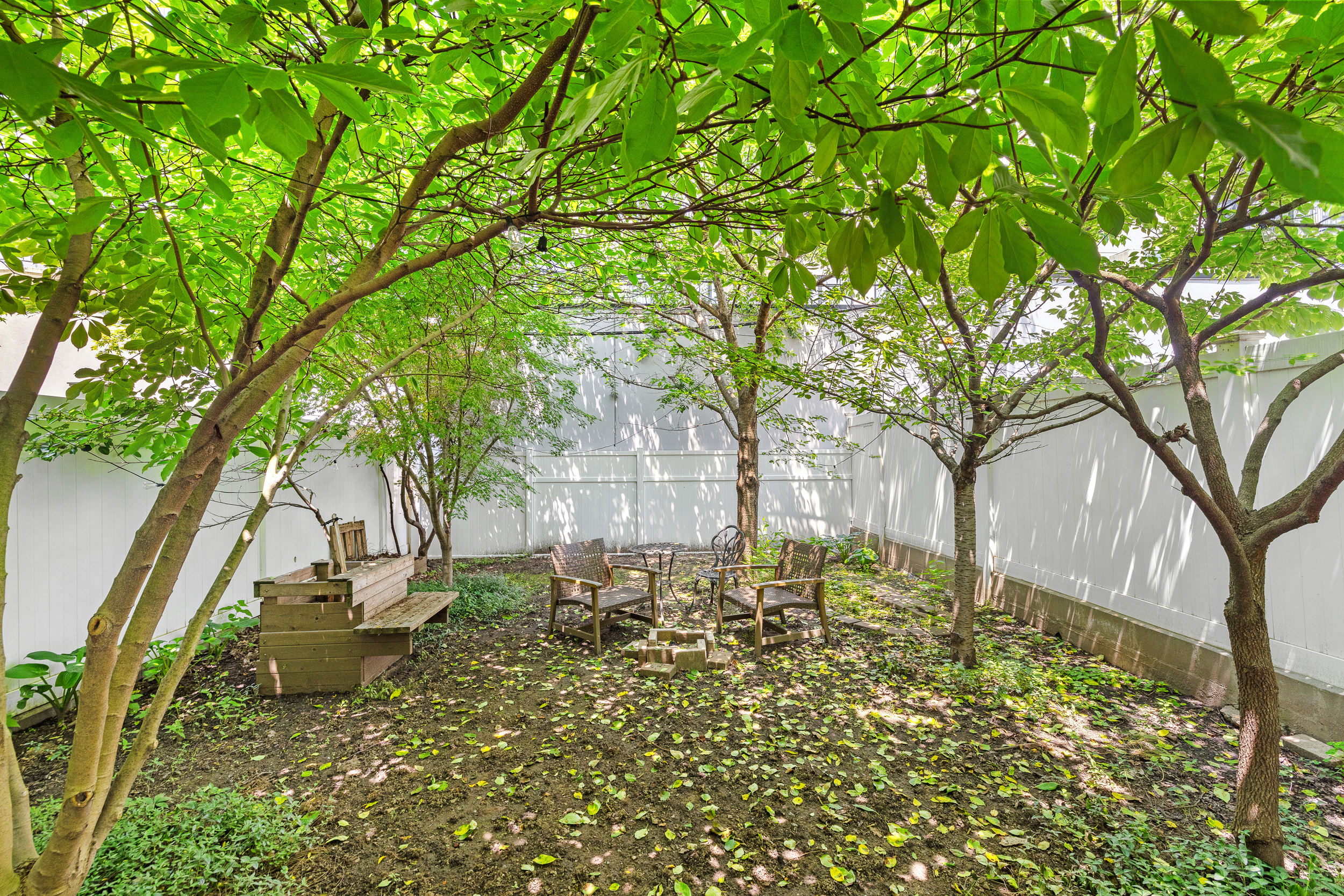 65 Jackson Street Brooklyn, NY 11211 - Photo 13 of 36 a backyard of a house with lots of green space