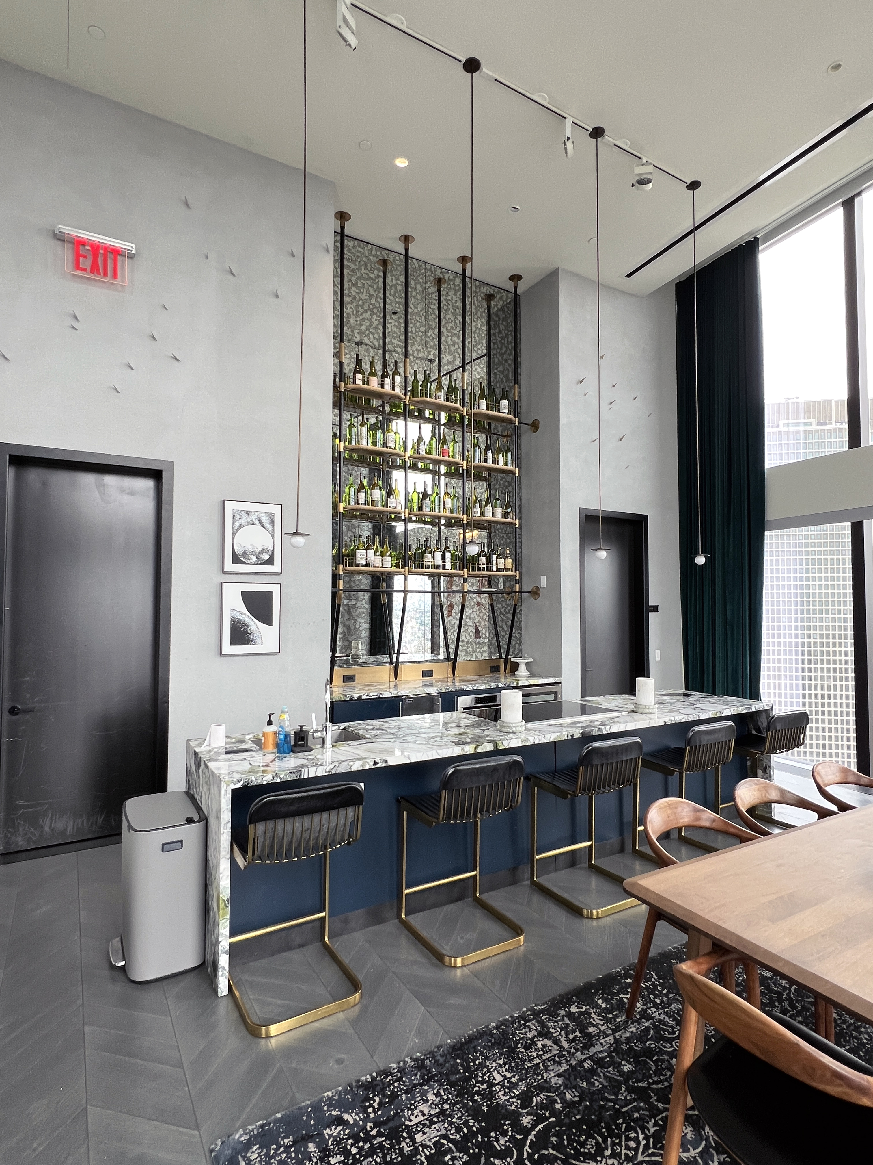 11 Hoyt Street, Unit 10M Brooklyn, NY 11201 - Photo 13 of 24 a kitchen with a sink dishwasher and a refrigerator with wooden cabinets