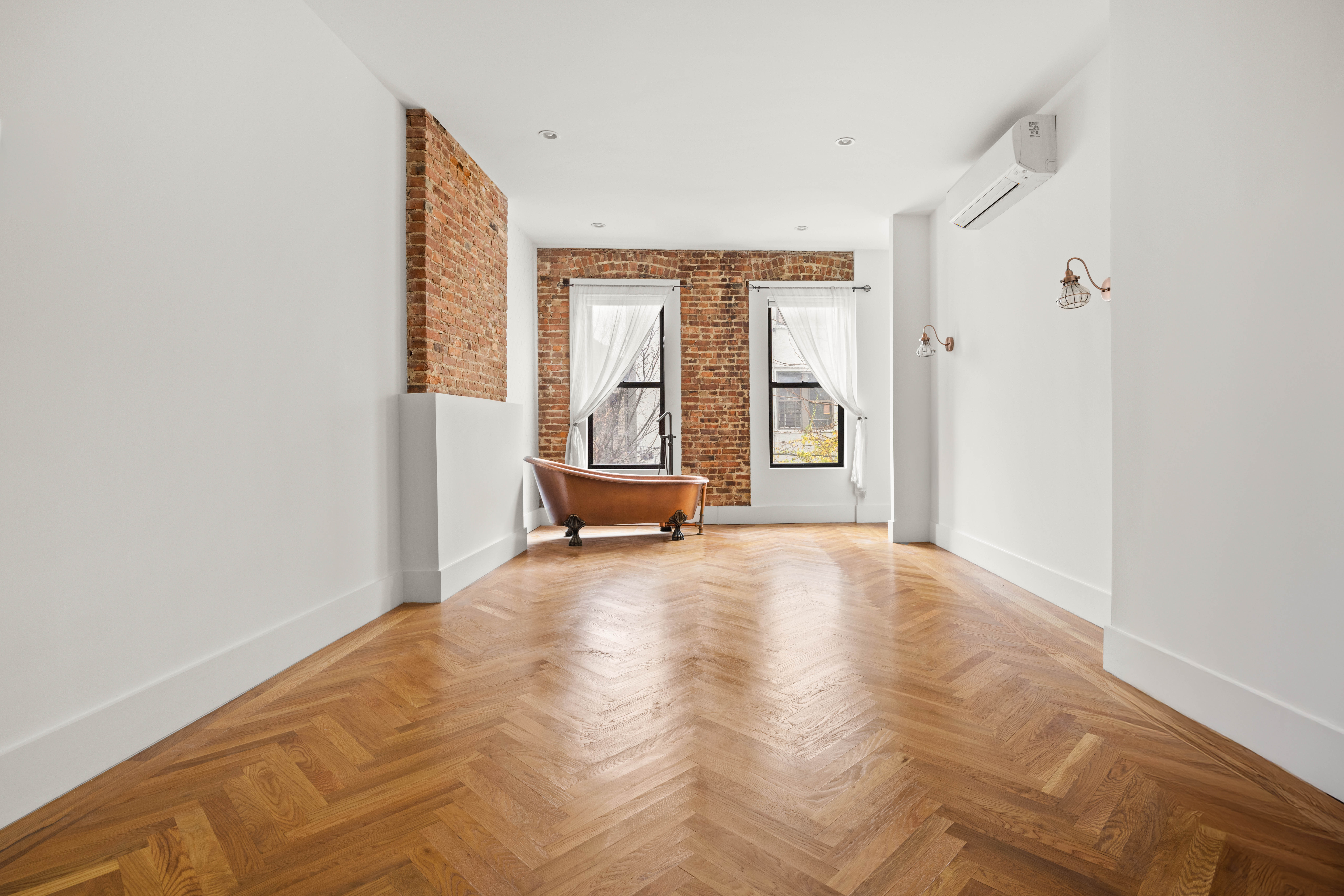 750 Lincoln Place Brooklyn, NY 11216 - Photo 9 of 24 a view of an empty room with a fireplace