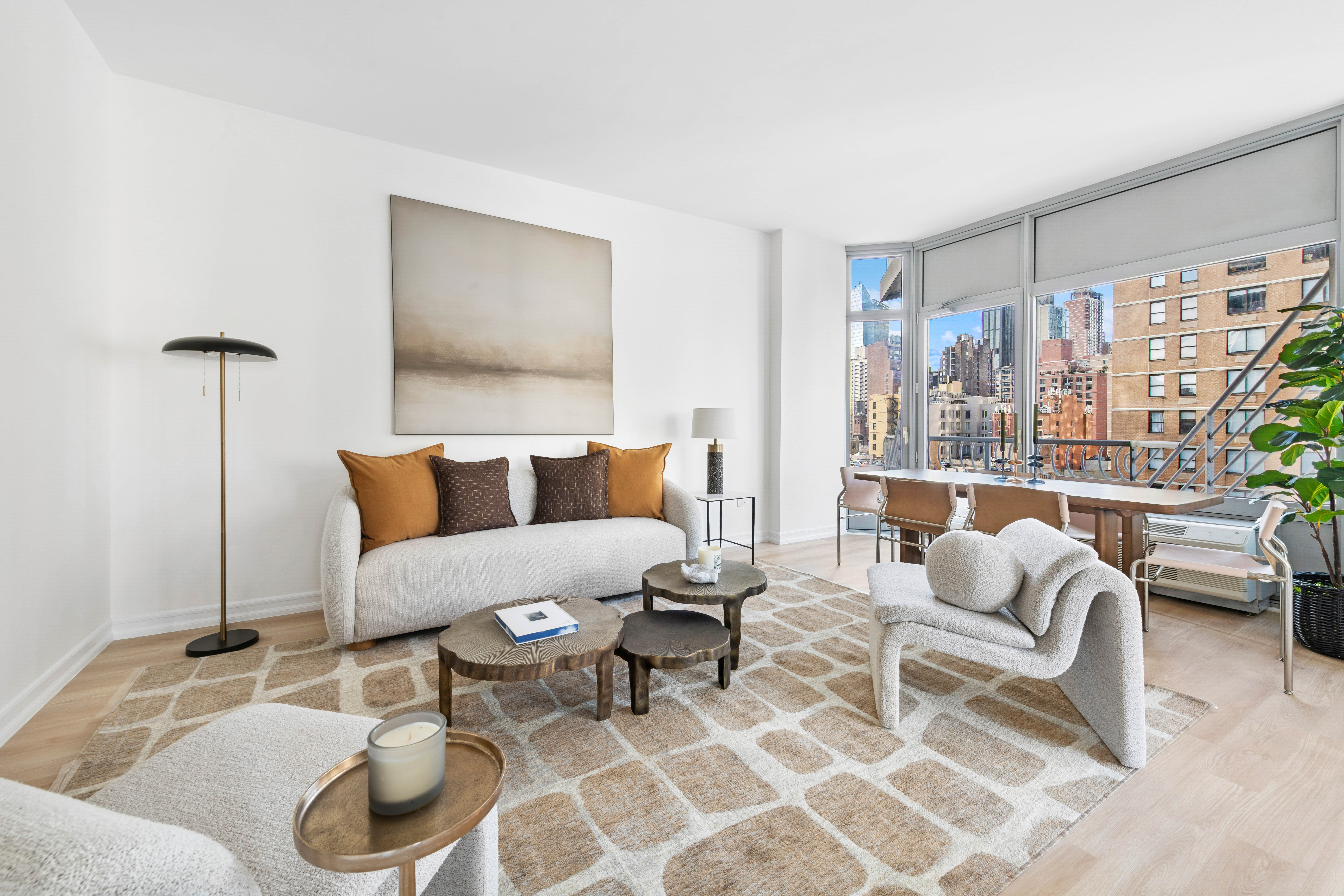 200 East 32nd Street, Unit 11D Manhattan, NY 10016 - Photo 2 of 19 a living room with furniture and a floor to ceiling window