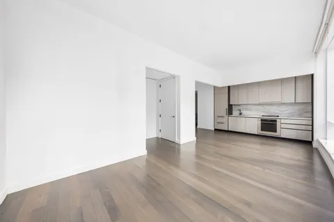 a view of kitchen with wooden floor