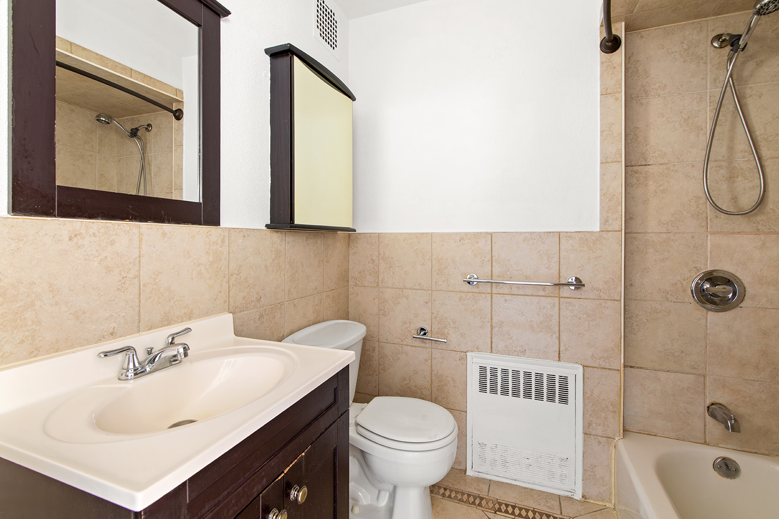 572 92nd Street Brooklyn, NY 11209 - Photo 14 of 20 a bathroom with a sink toilet and shower