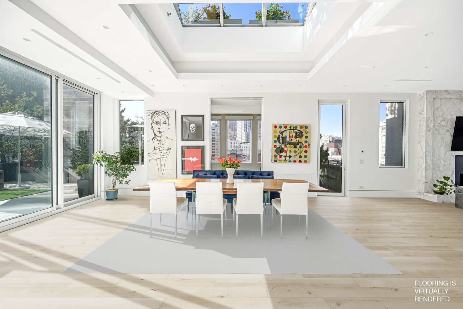 a dining room with wooden floor and large windows