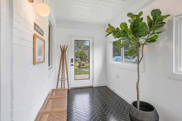 a view of entryway with wooden floor