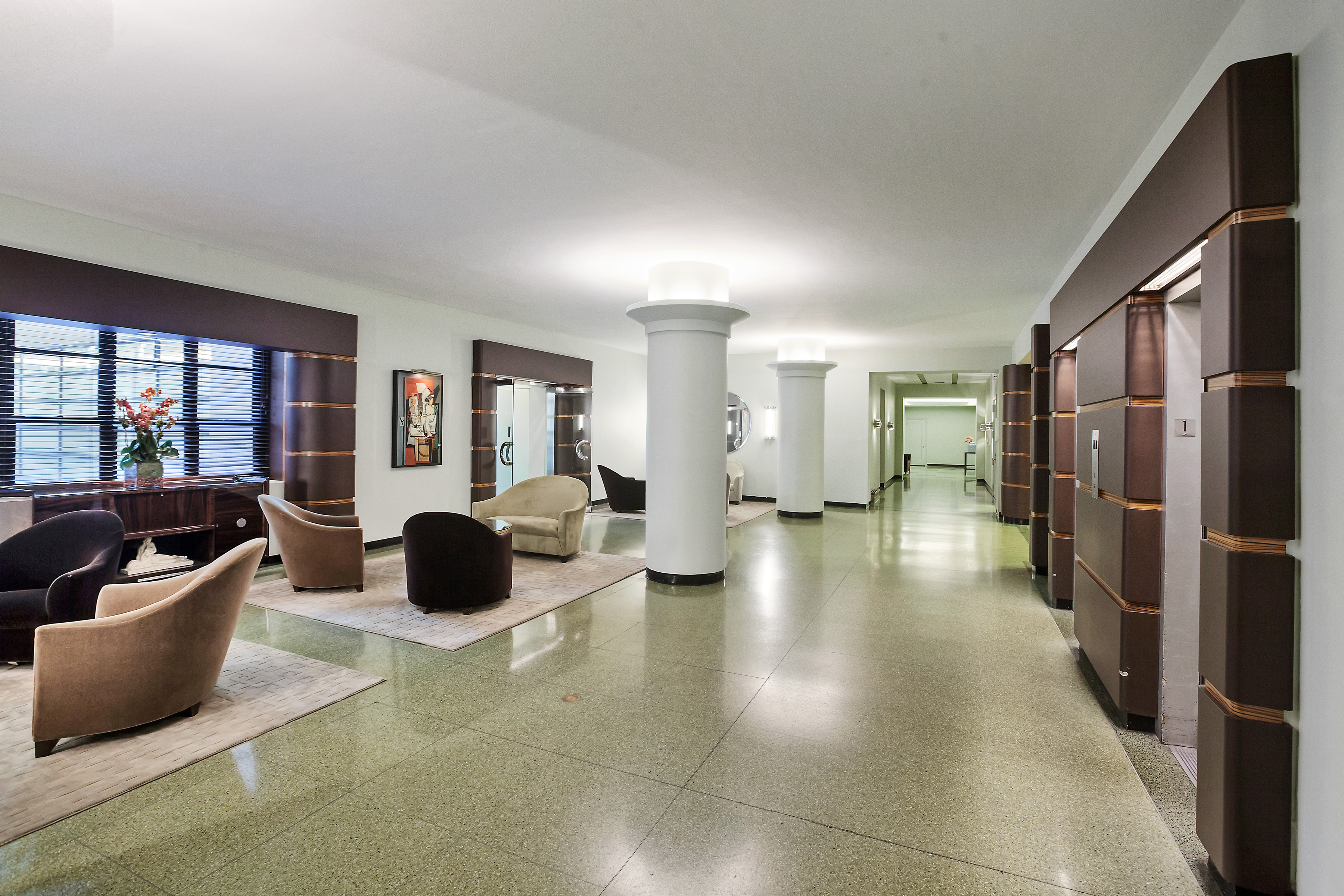 235 East 22nd Street, Unit 2R Manhattan, NY 10010 - Photo 12 of 15 a living room with furniture and a large window