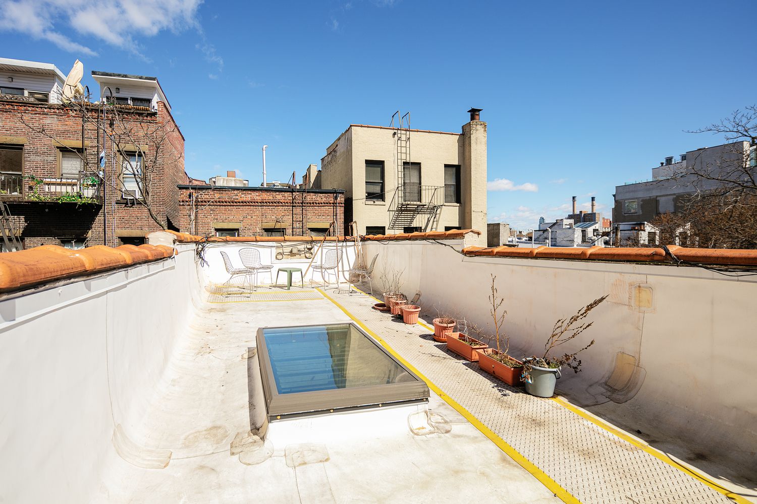 427 East 6th Street, Unit 1R Manhattan, NY 10009 - Photo 5 of 8 a view of a swimming pool with a lounge chairs