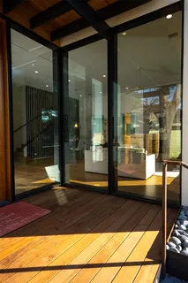 a view of a room with furniture and a window